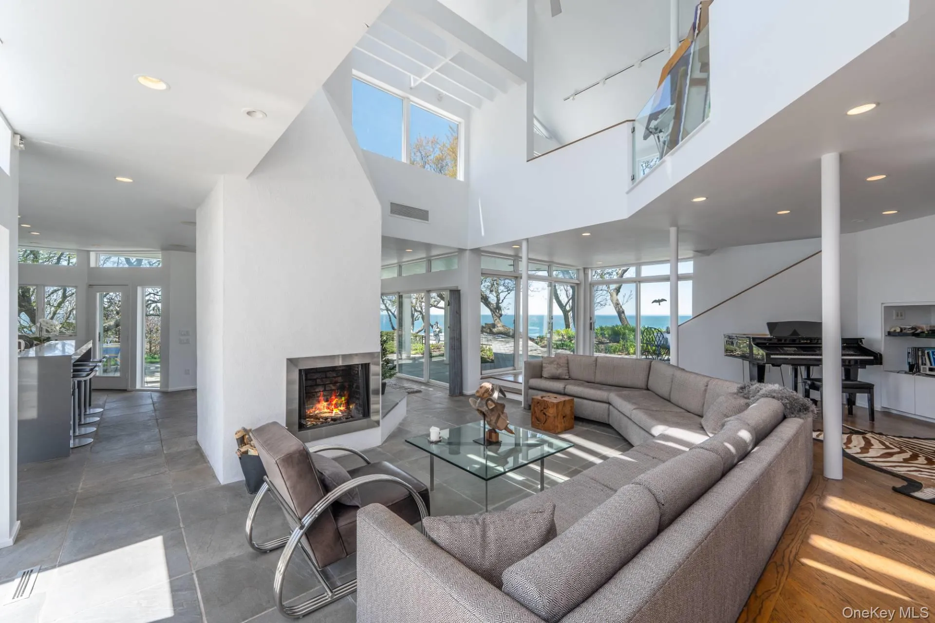 Three fireplaces create a warm, sophisticated interior Three fireplaces create a warm, sophisticated interior