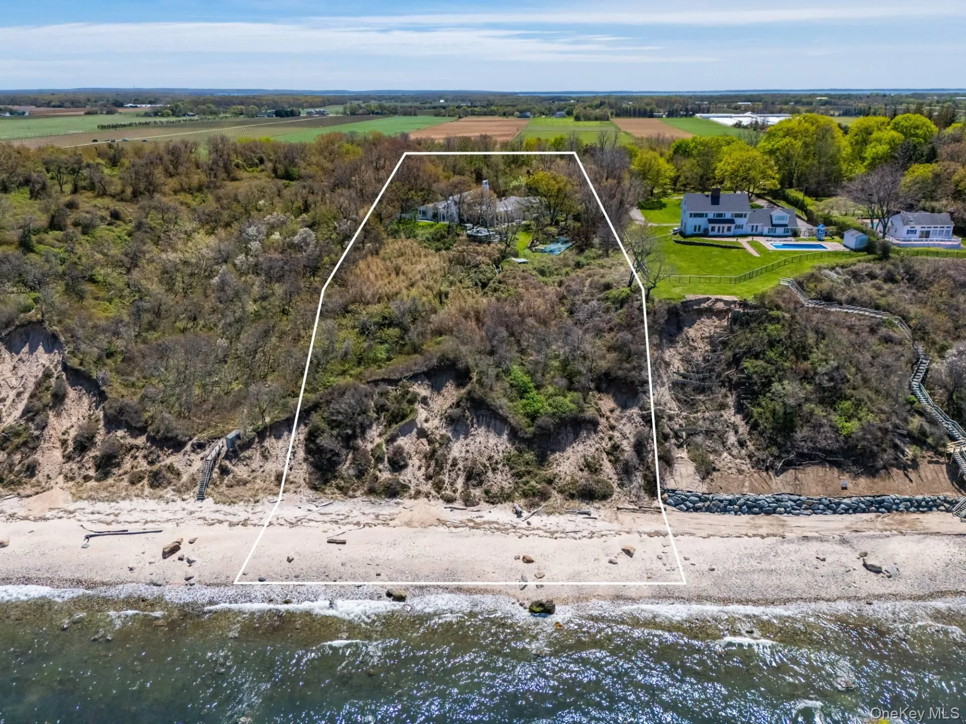 Aerial view of the property and the Long Island Sound Aerial view of the property and the Long Island Sound