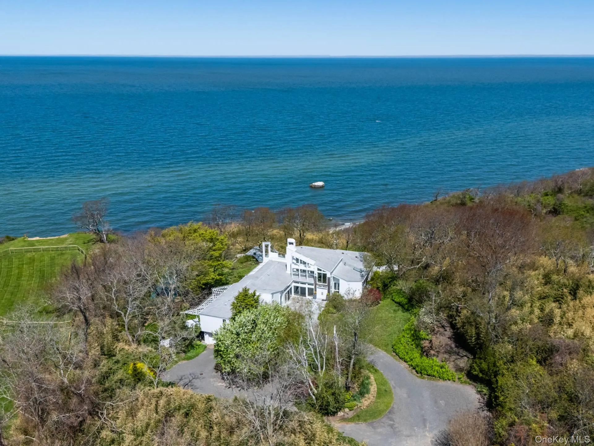 Aerial view of the property and the Long Island Sound Aerial view of the property and the Long Island Sound