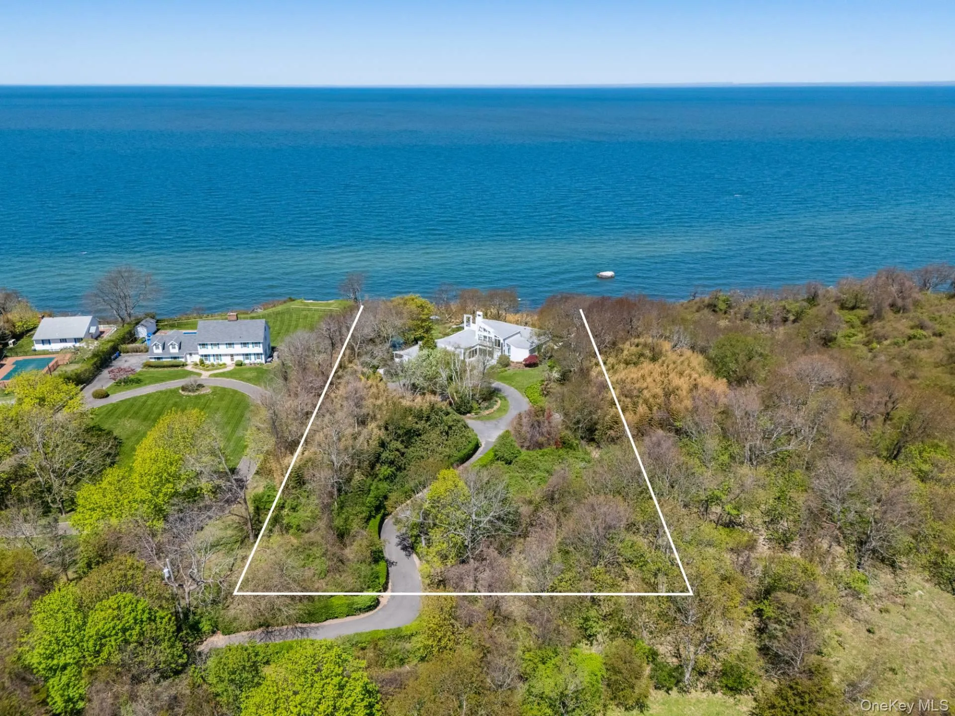 Aerial view of the property and the Long Island Sound Aerial view of the property and the Long Island Sound