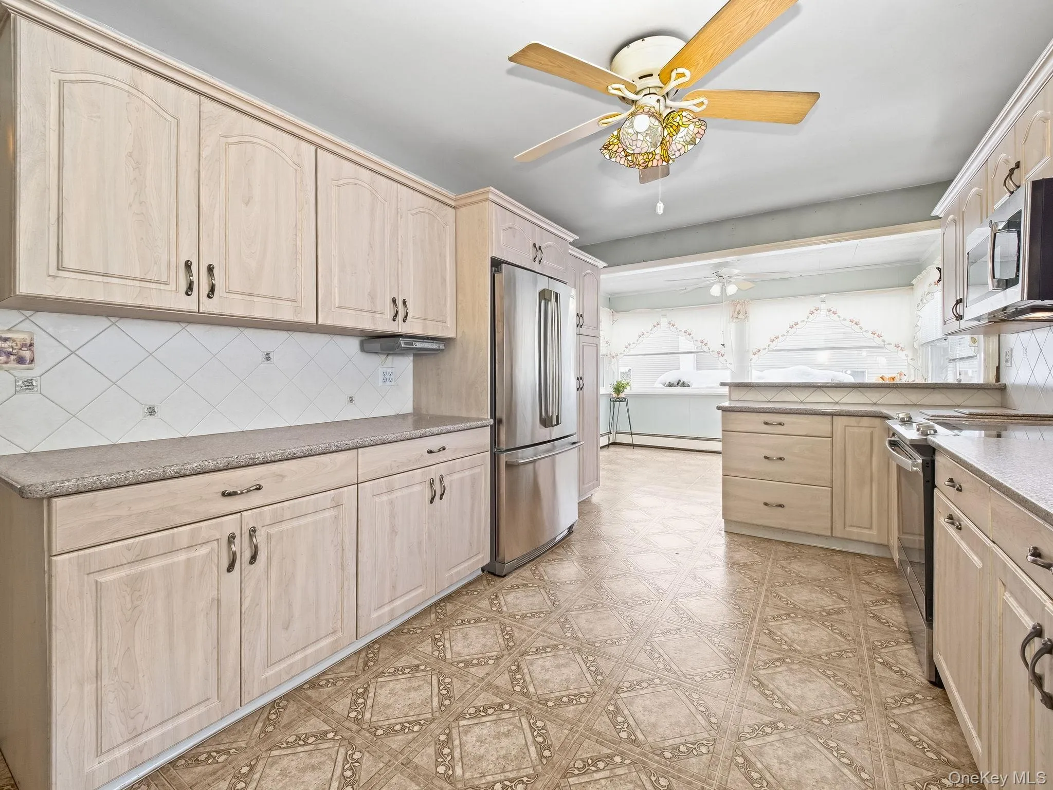 Renovated kitchen with custom cabinets. Renovated kitchen with custom cabinets.