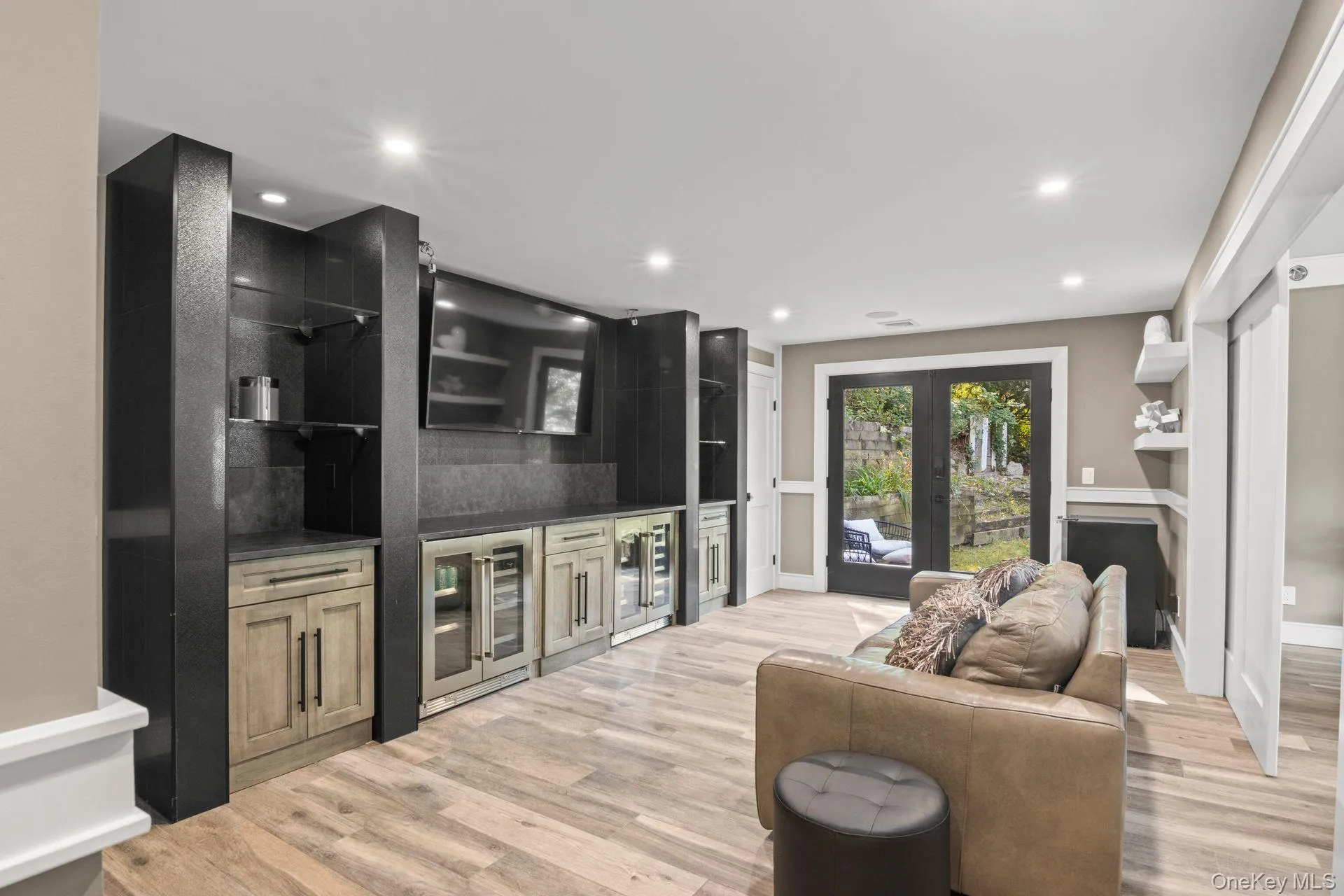 Built-In wet bar with beverage center and entertainment center. Built-In wet bar with beverage center and entertainment center.