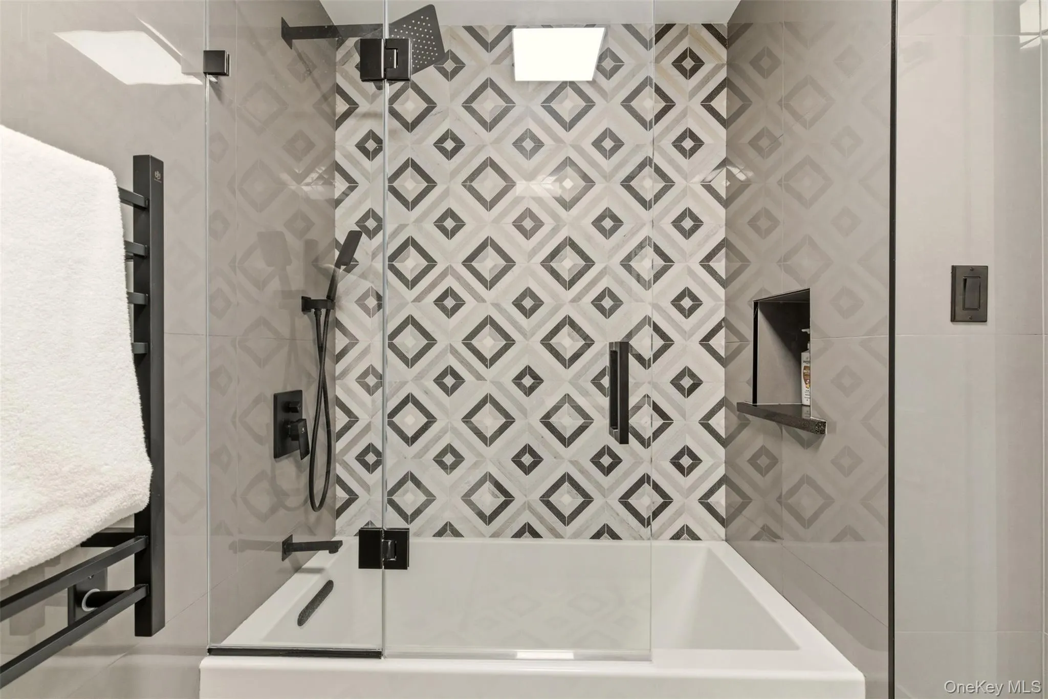 Beutiful tub & shower with tile as focal point Beutiful tub & shower with tile as focal point