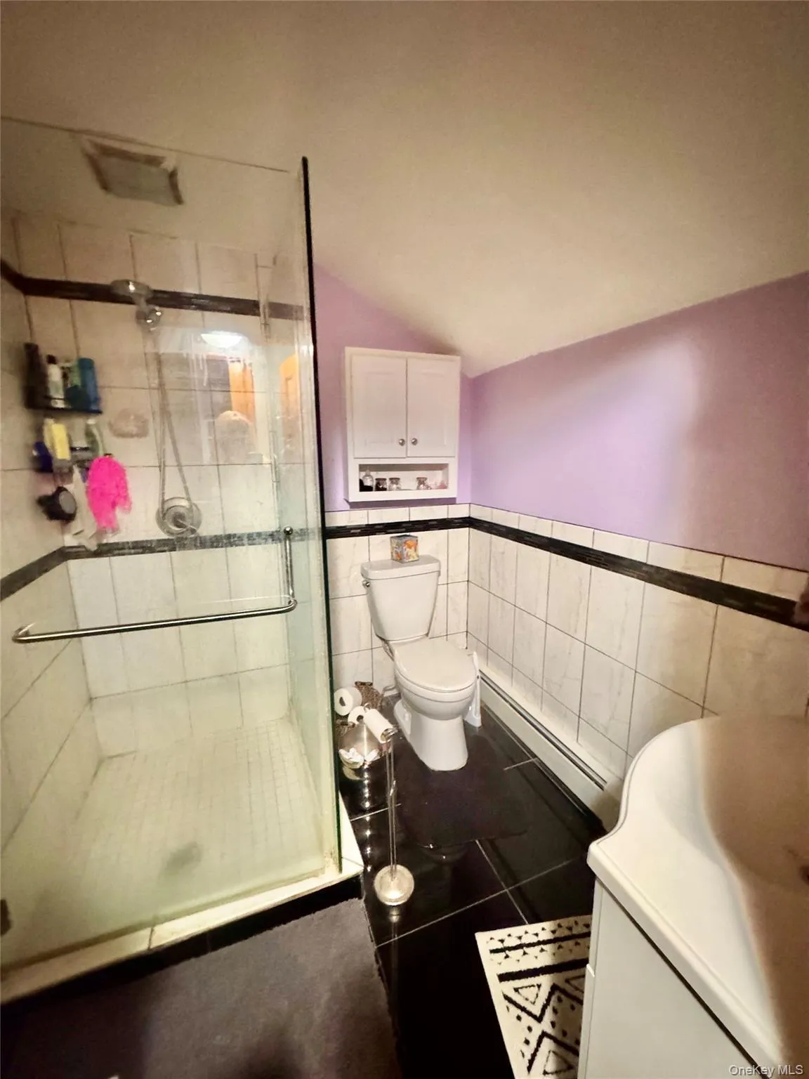 One of three full baths .. this one featuring an oversized glass enclosed shower. One of three full baths .. this one featuring an oversized glass enclosed shower.