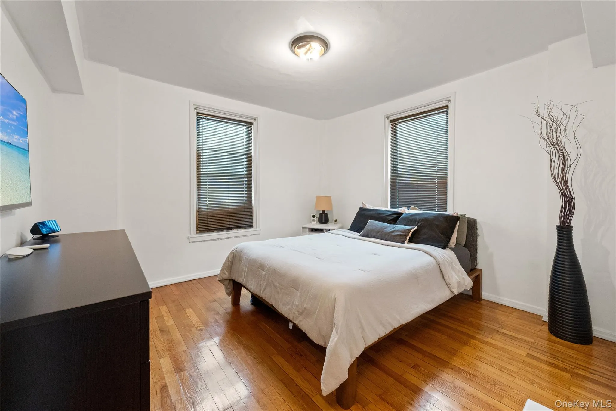 Bedroom featuring light wood-style floors Bedroom featuring light wood-style floors