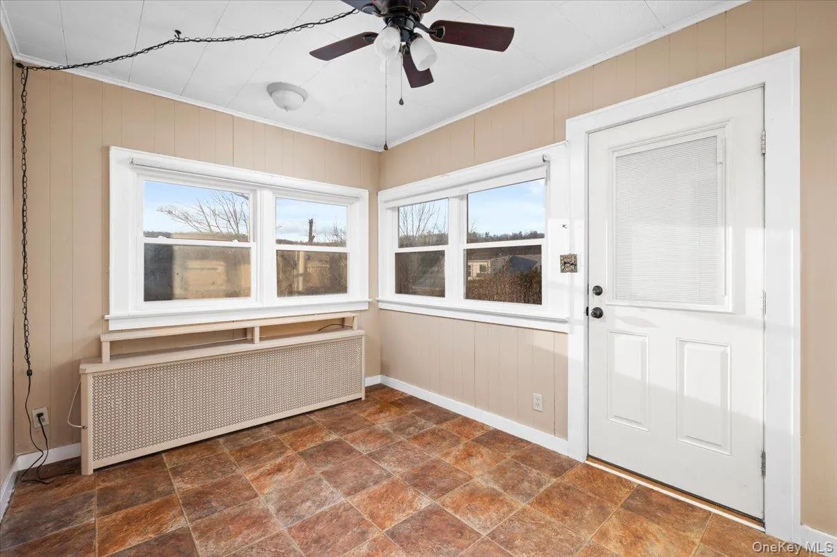 Breakfast area with access to the deck and patio Breakfast area with access to the deck and patio