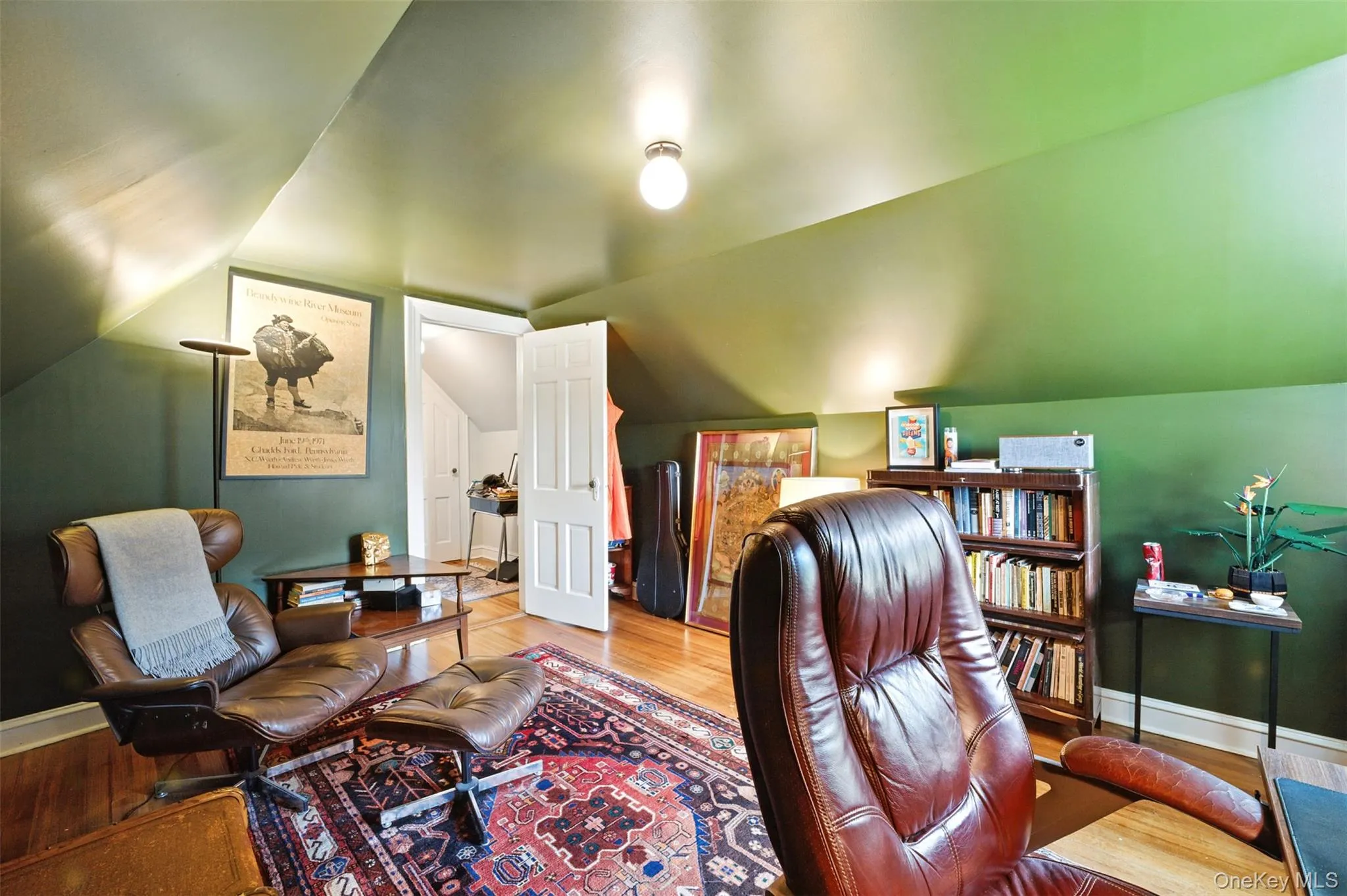 Alternate view of 4th Bedroom being used as Office space featuring wood finished floors and vaulted ceiling Alternate view of 4th Bedroom being used as Office space featuring wood finished floors and vaulted ceiling