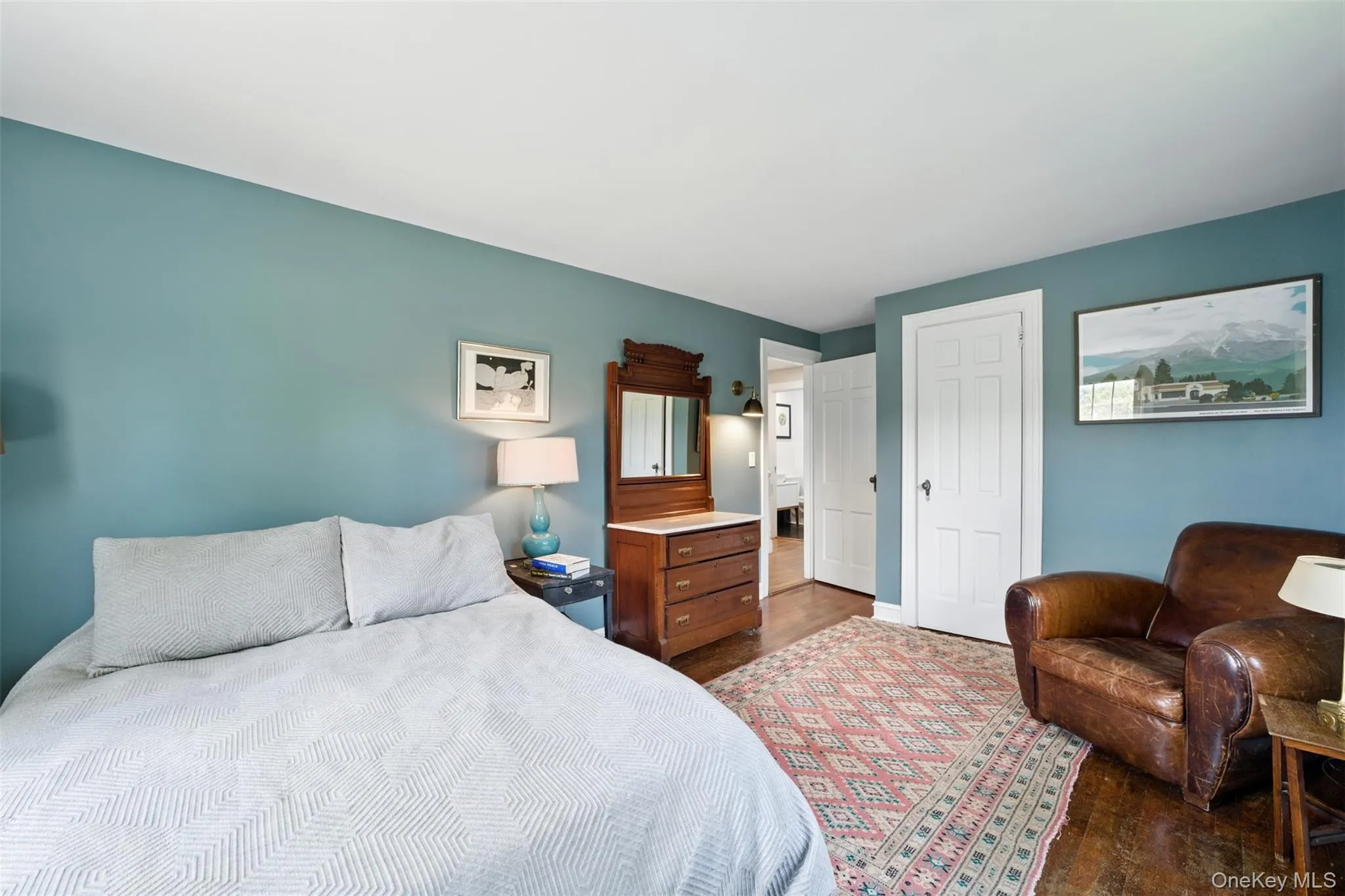 1st Bedroom featuring wood finished floors and a closet 1st Bedroom featuring wood finished floors and a closet