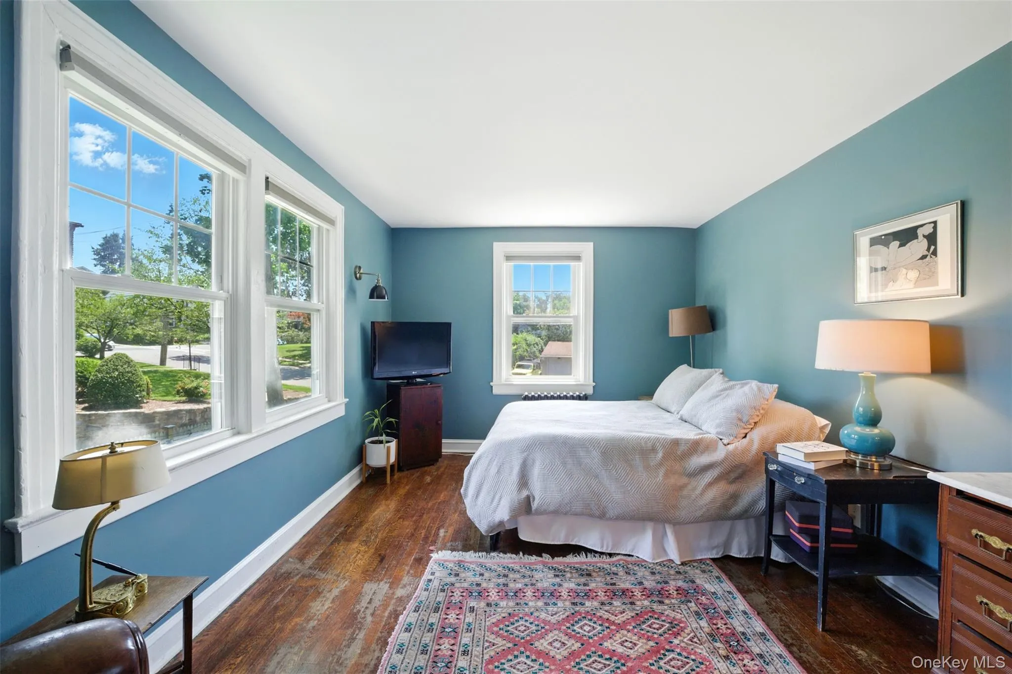Alternate view of 1st Bedroom with dark wood-style flooring Alternate view of 1st Bedroom with dark wood-style flooring