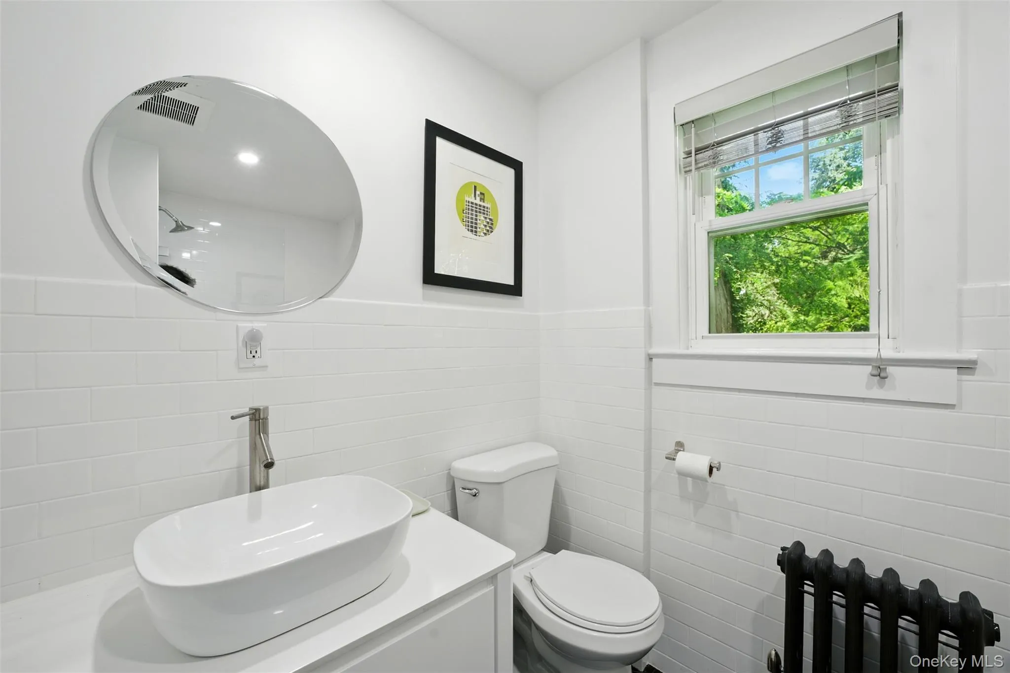 Alternate view of 1st Full Bathroom with tile walls and wainscoting Alternate view of 1st Full Bathroom with tile walls and wainscoting