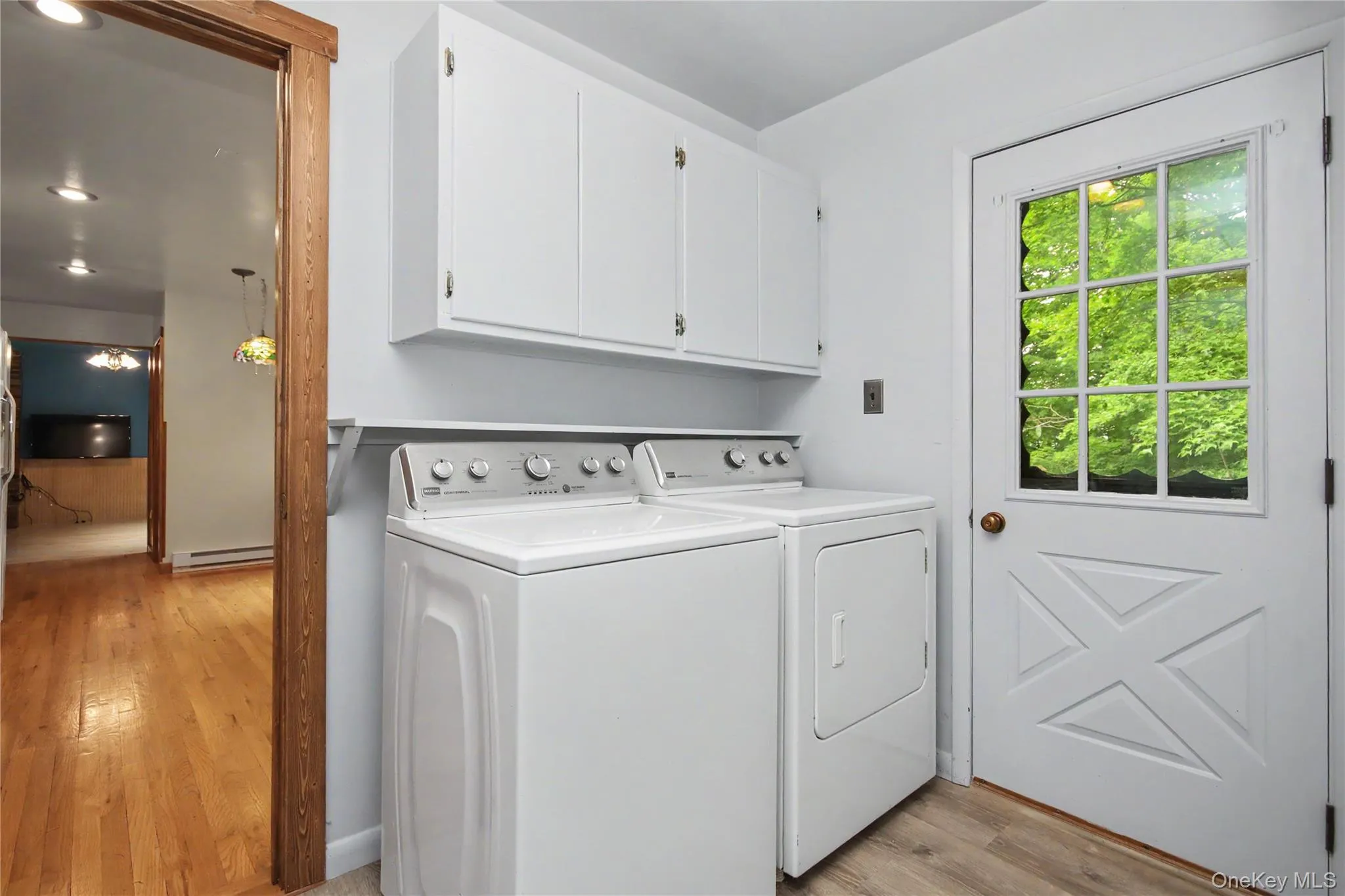 Laundry room with door to outside Laundry room with door to outside