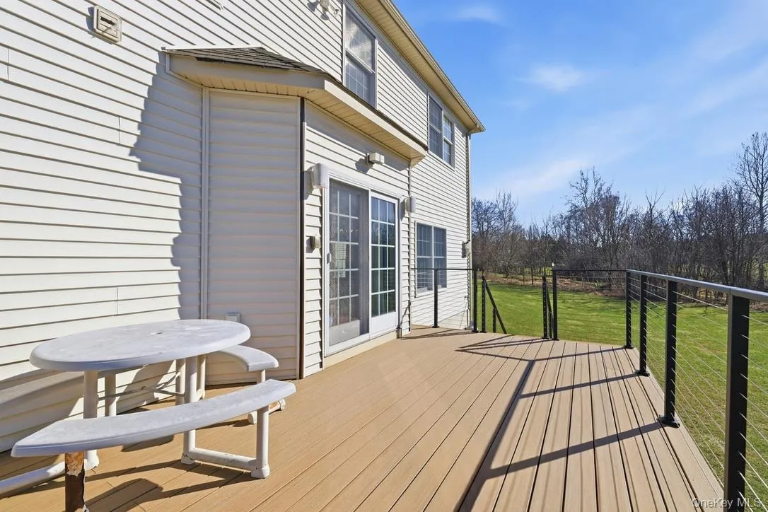 A new deck overlooks your private backyard is awaiting your summer fun! A new deck overlooks your private backyard is awaiting your summer fun!