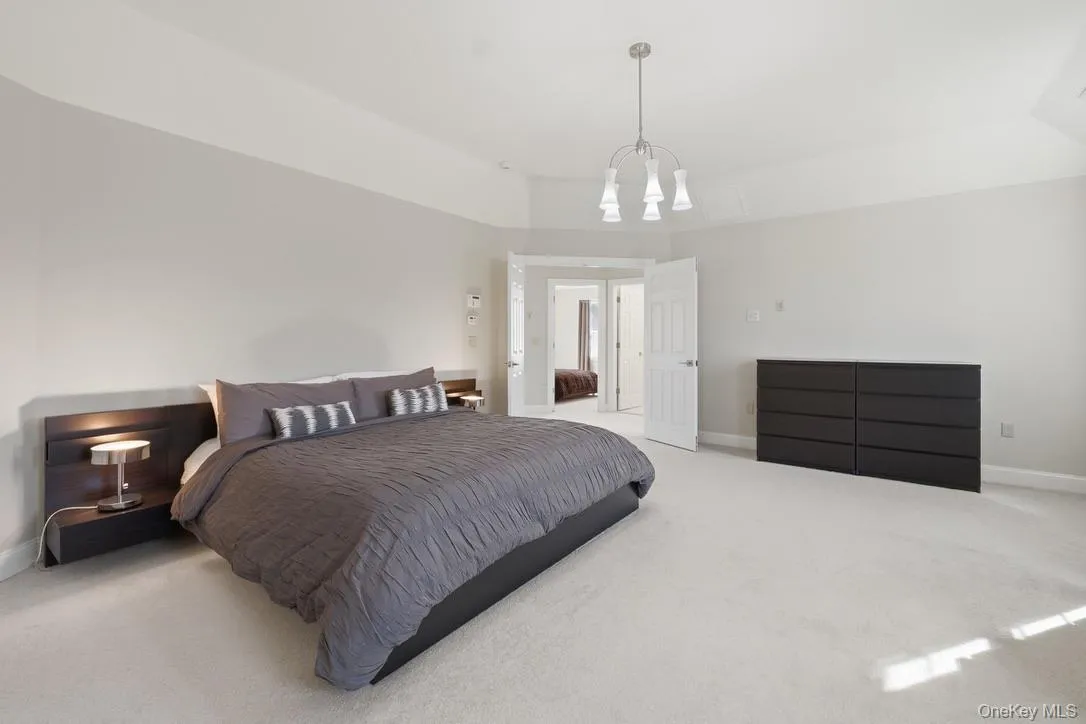 Vaulted ceiling and surroung sound grace the primary bedroom ~ a truly relaxing retreat. Vaulted ceiling and surroung sound grace the primary bedroom ~ a truly relaxing retreat.