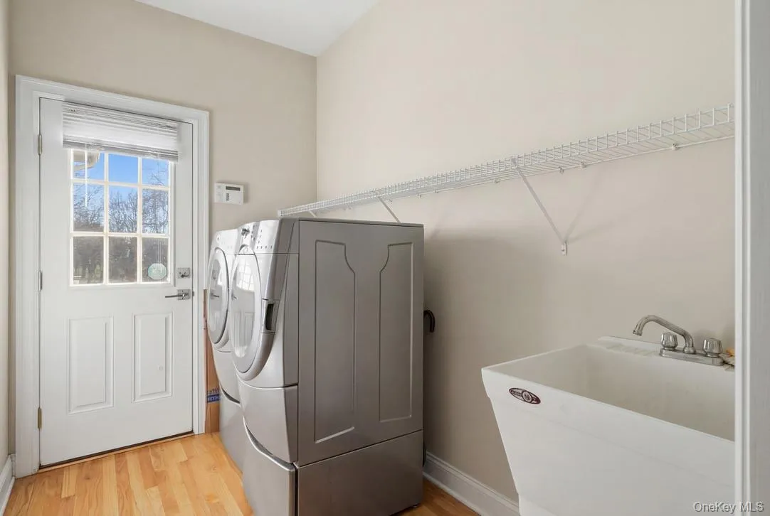 The laundry room on the main floor doubles as a mudroom and has access to the garage and yard. The laundry room on the main floor doubles as a mudroom and has access to the garage and yard.