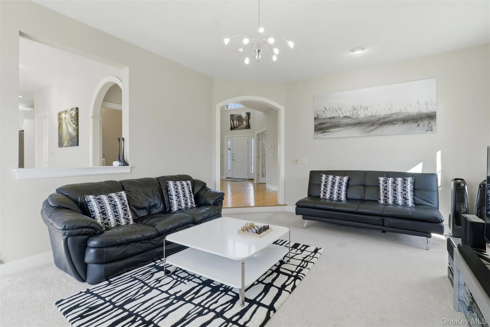 The family room offers a comfortable space for family time ~ movie night, game night, or just casual conversation. The family room offers a comfortable space for family time ~ movie night, game night, or just casual conversation.