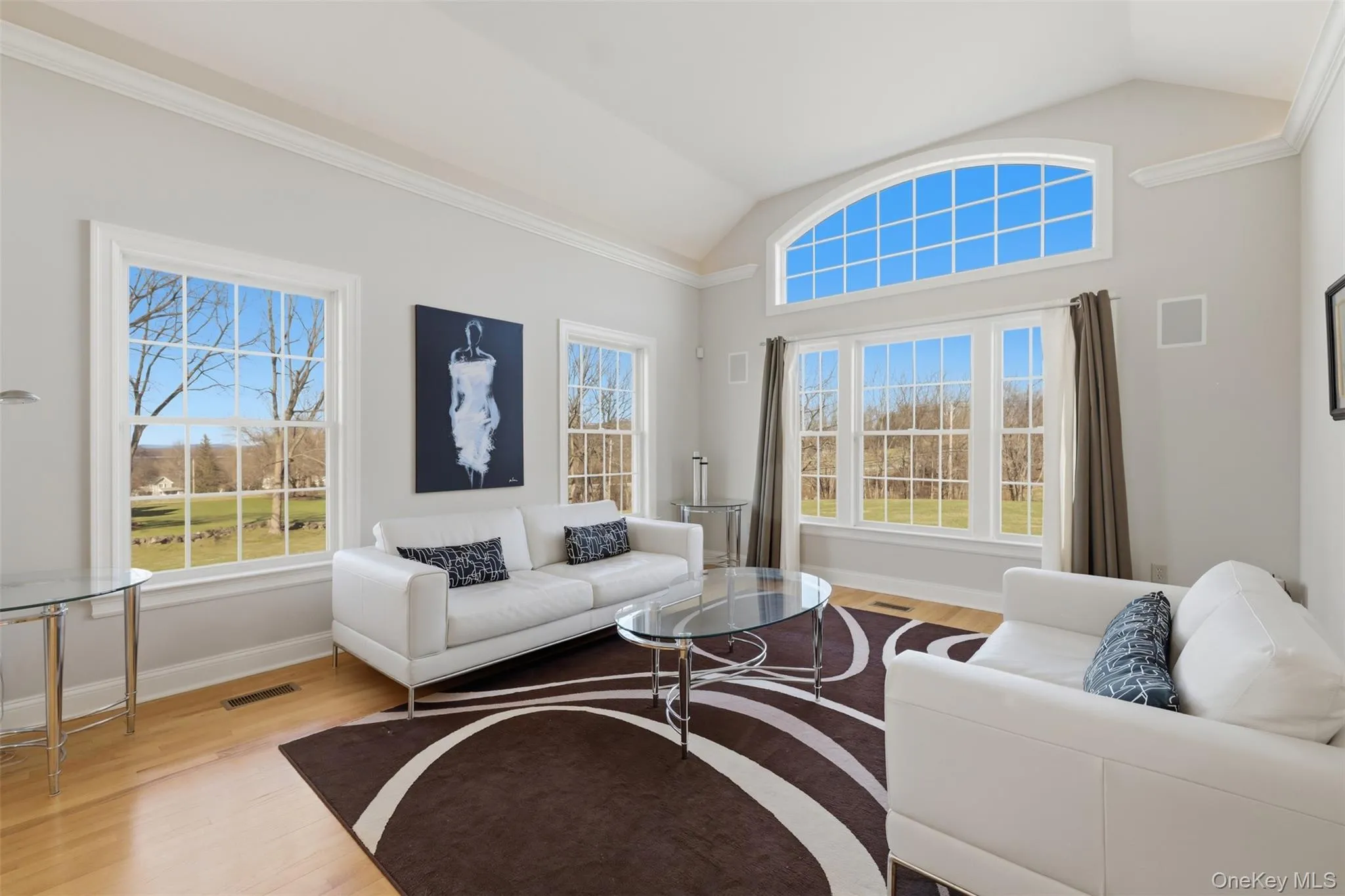 A traditional floor plan with a modern feel ~ the living room fills with natural light and is a comfortable place for conversation or enjoying a quiet afternoon. A traditional floor plan with a modern feel ~ the living room fills with natural light and is a comfortable place for conversation or enjoying a quiet afternoon.