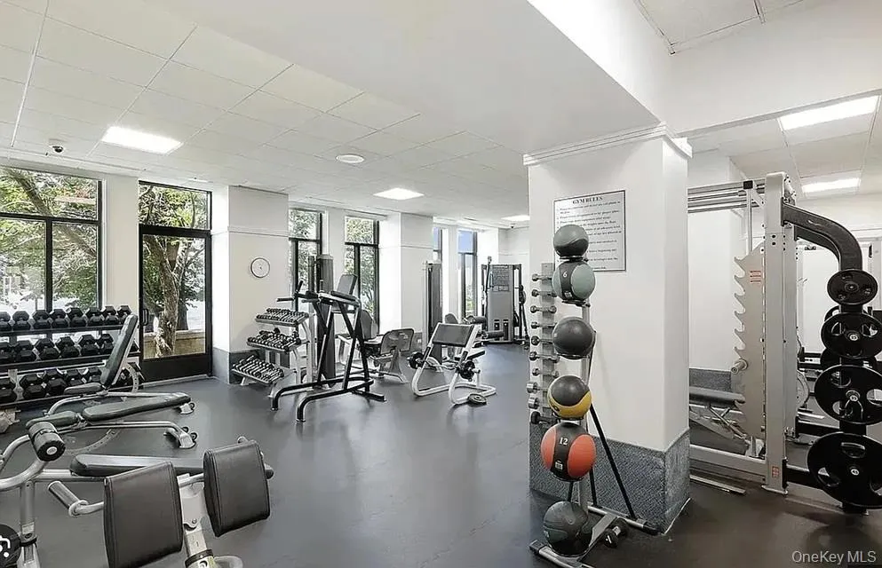 Exercise room featuring a drop ceiling Exercise room featuring a drop ceiling