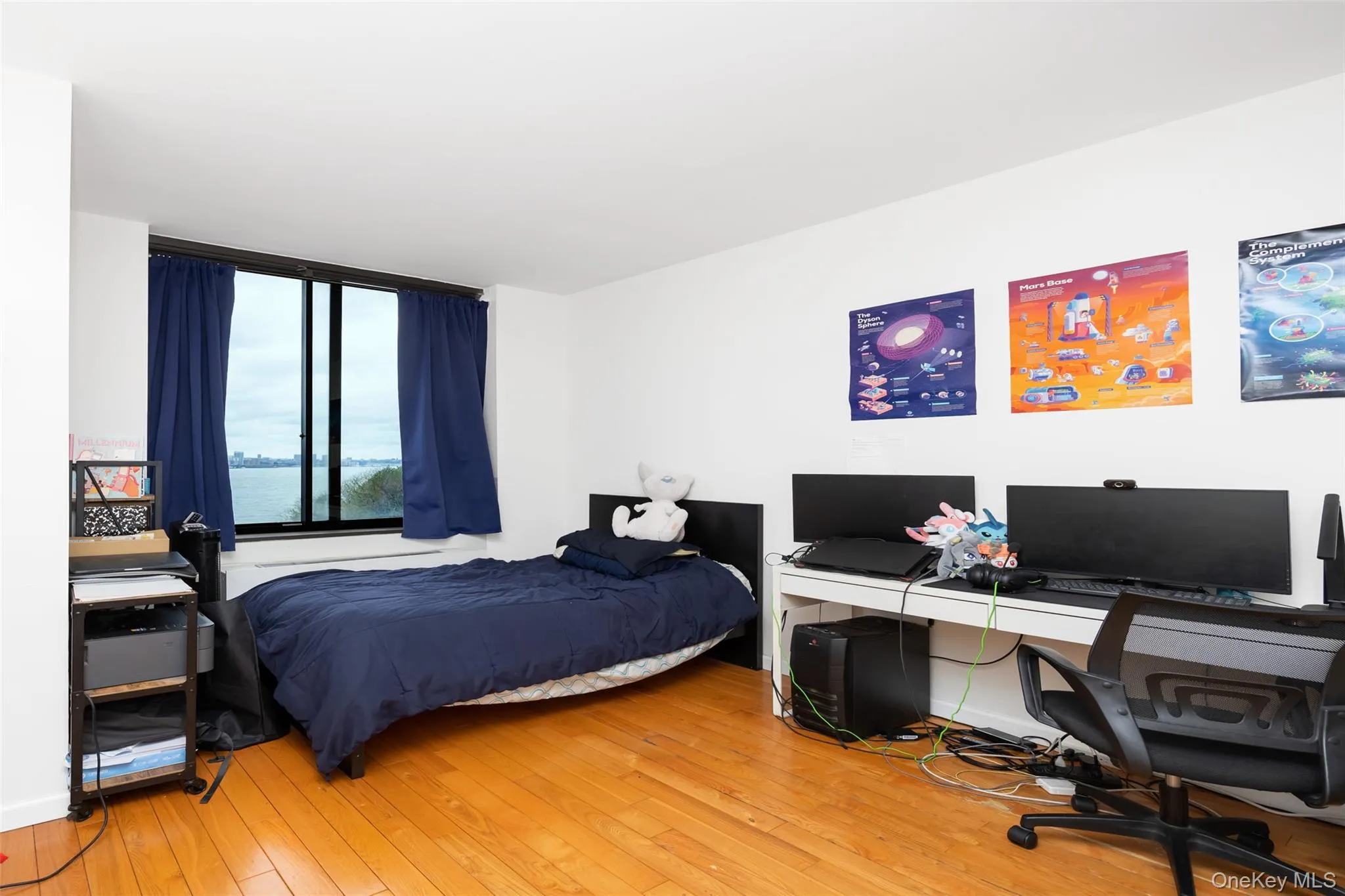 Bedroom with hardwood / wood-style floors Bedroom with hardwood / wood-style floors
