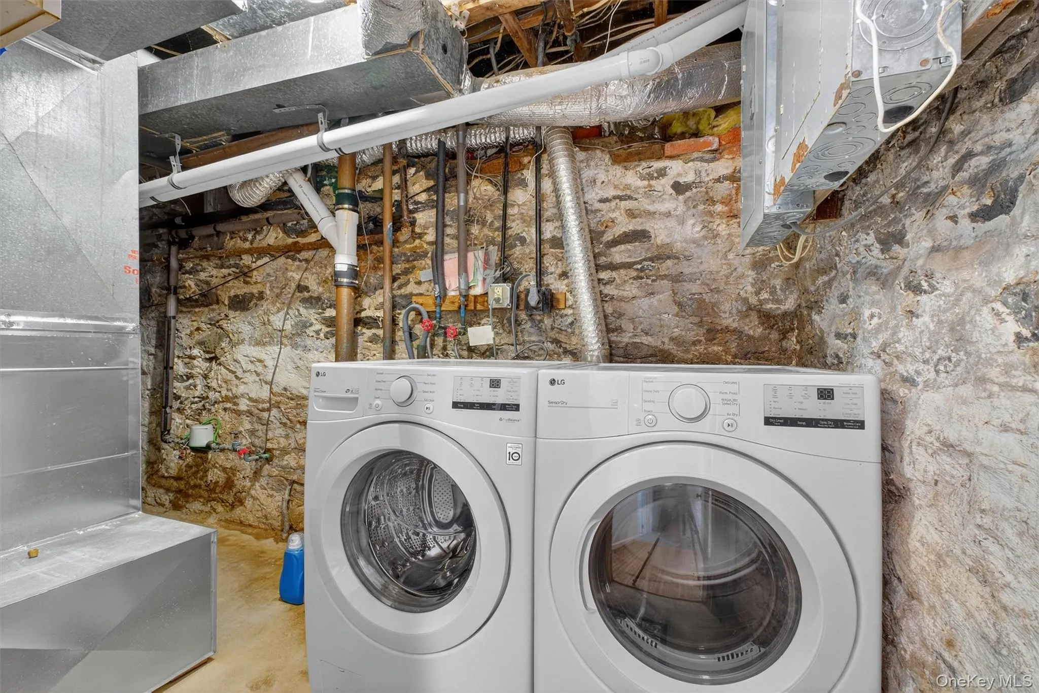 Washroom featuring independent washer and dryer and heating unit Washroom featuring independent washer and dryer and heating unit