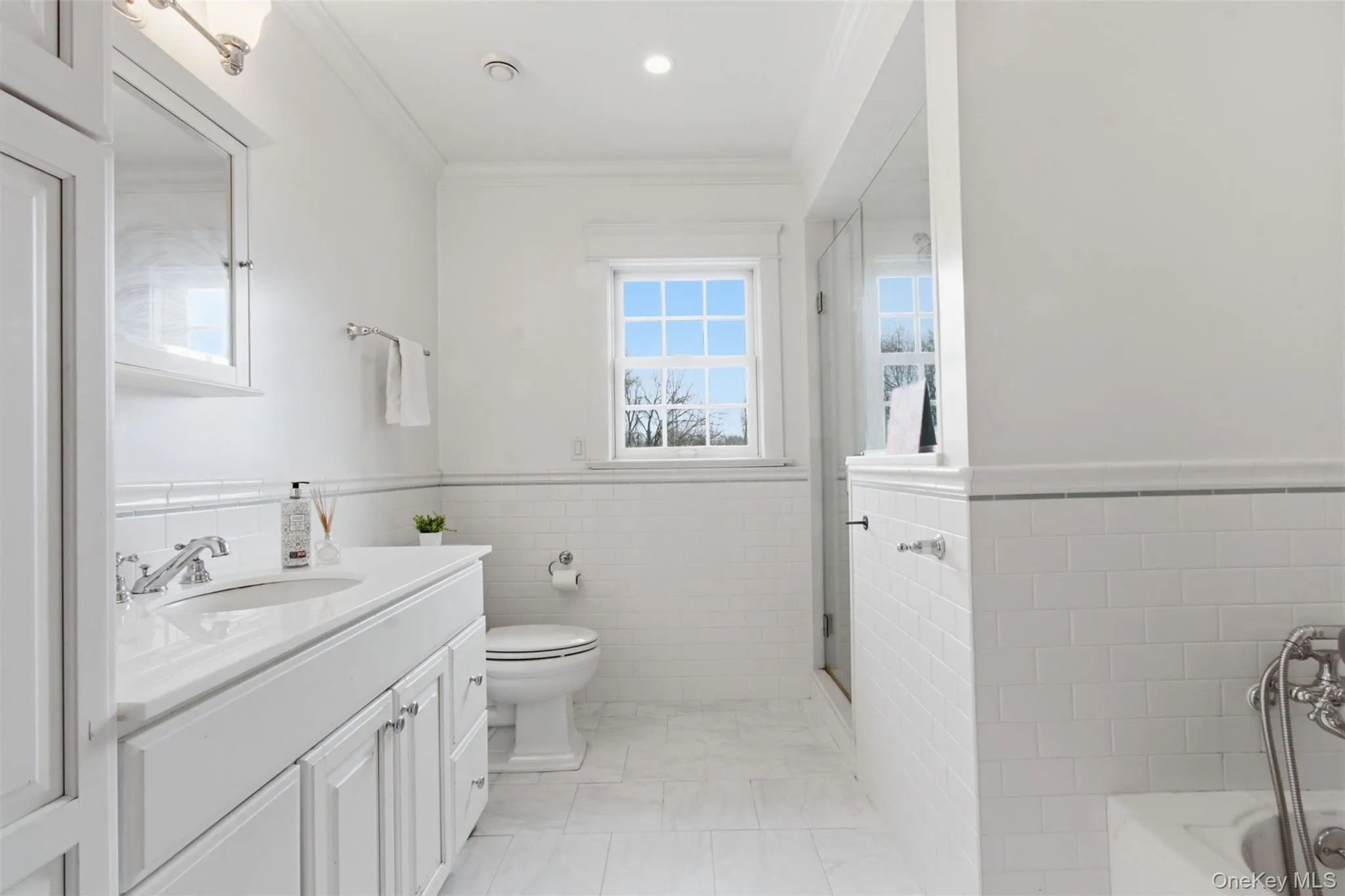 En-suite bath with shower and tub, serves 2nd floor bedroom #1 En-suite bath with shower and tub, serves 2nd floor bedroom #1