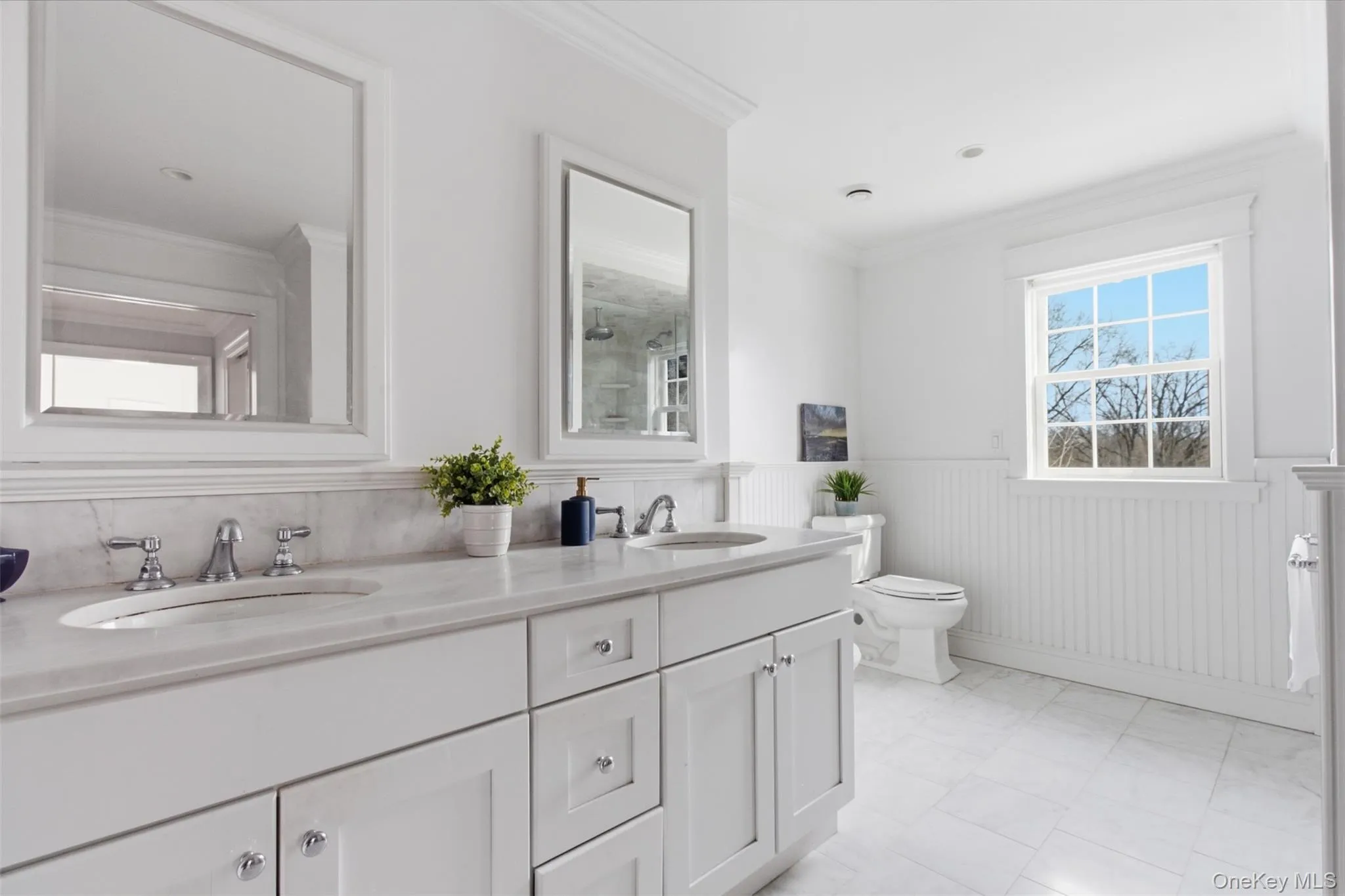 En-suite primary bathroom with soaking tub, double sinks and rain shower En-suite primary bathroom with soaking tub, double sinks and rain shower