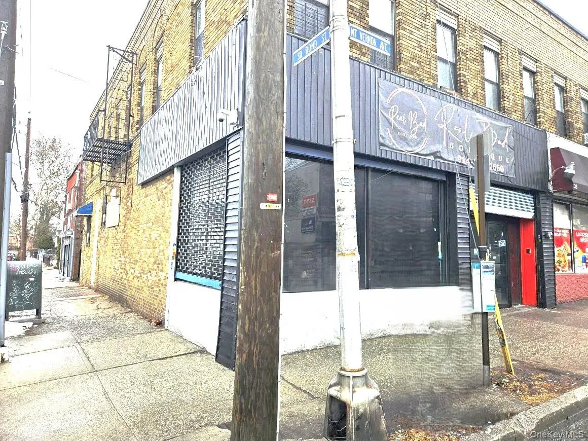 View of building exterior. Corner storefront. View of building exterior. Corner storefront.