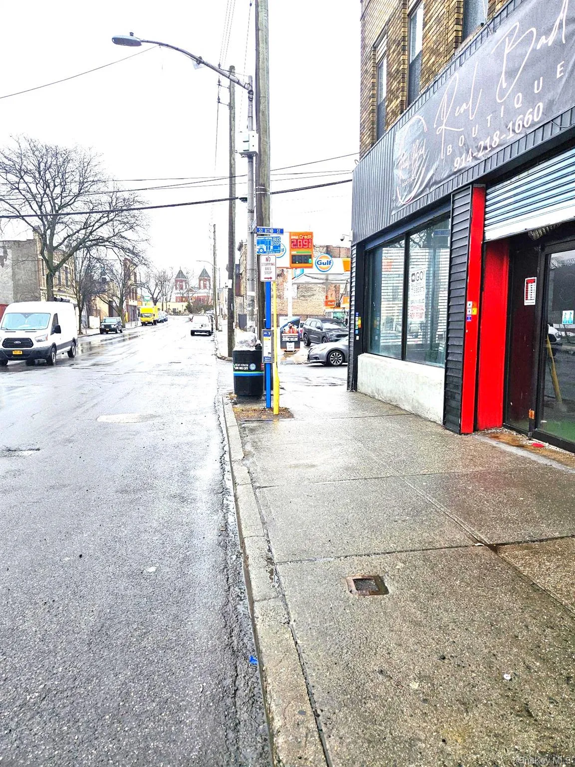 View of street. featuring bus stop. View of street. featuring bus stop.