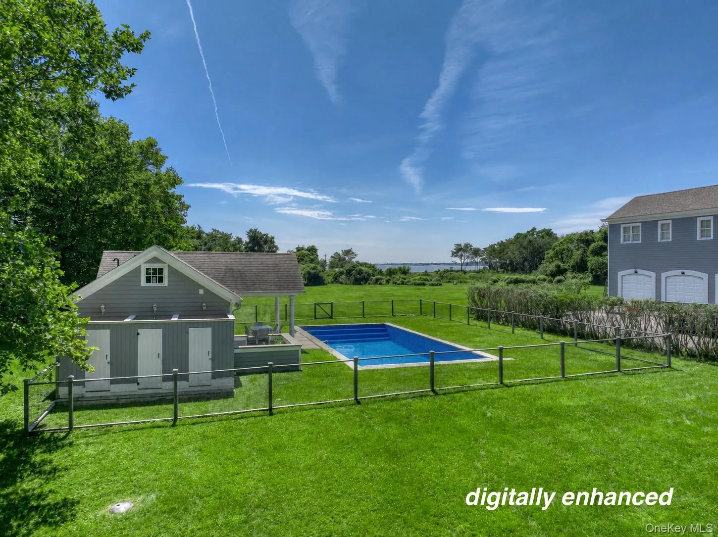 pool, pool house, 3-bay garage on east side of house pool, pool house, 3-bay garage on east side of house