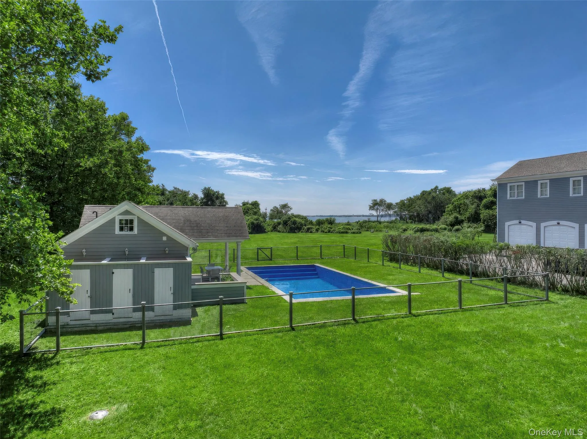 pool, pool house, 3-bay garage on east side of house pool, pool house, 3-bay garage on east side of house