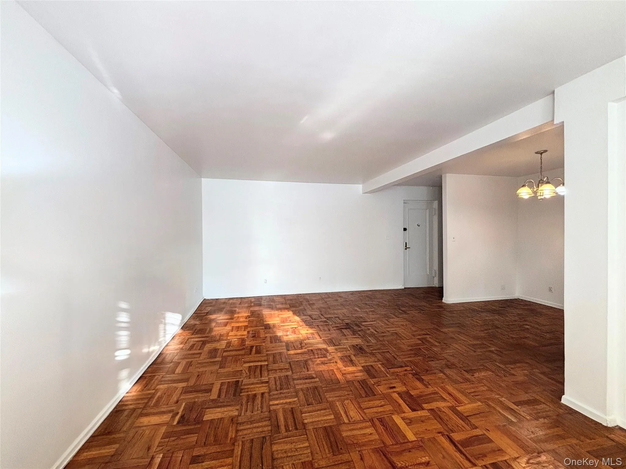 Living room with dining area/home office. Living room with dining area/home office.