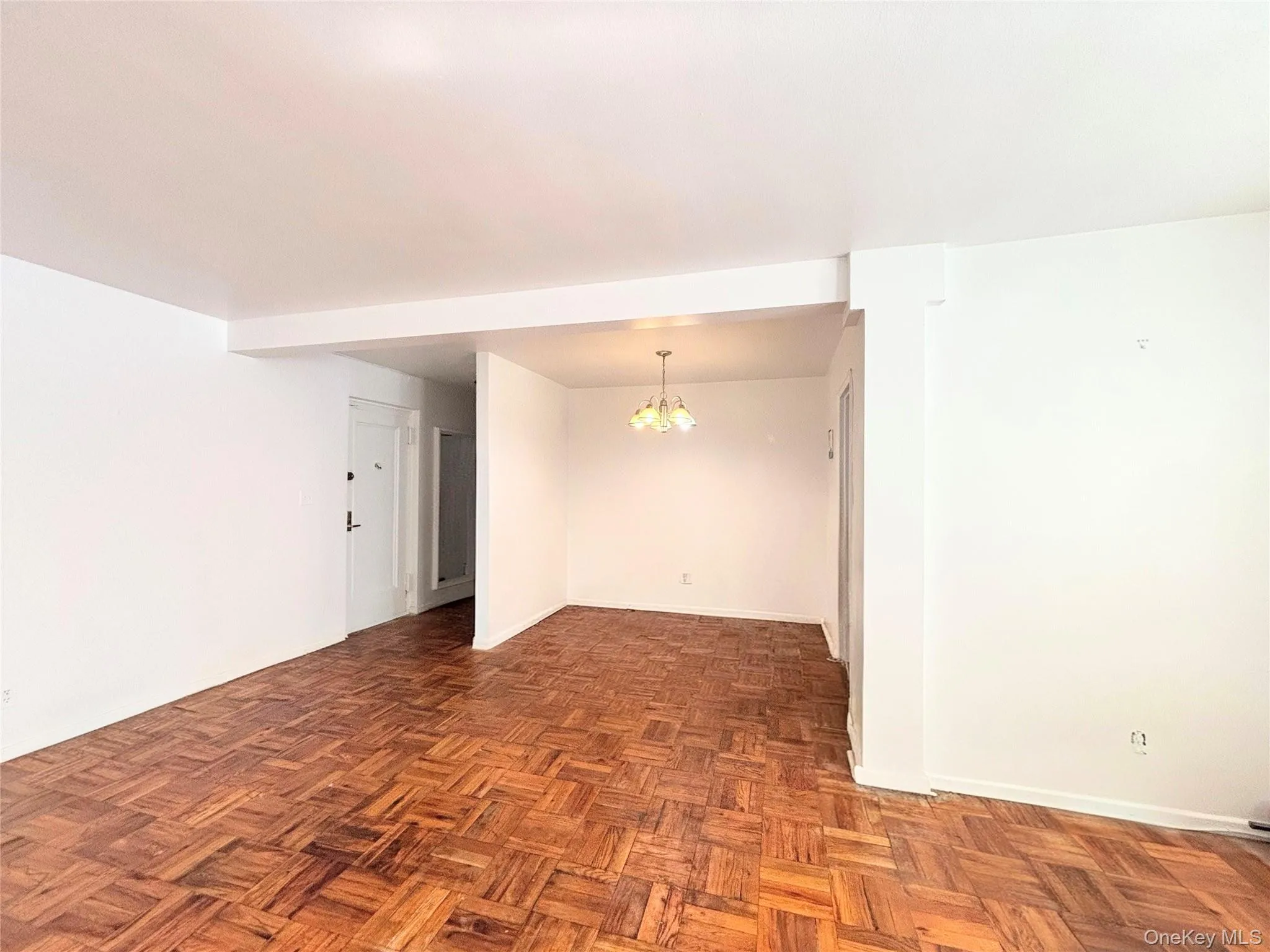 Entrance into apartment leads to living room, dining area/home office and kitchen then hallway to bedrooms Entrance into apartment leads to living room, dining area/home office and kitchen then hallway to bedrooms