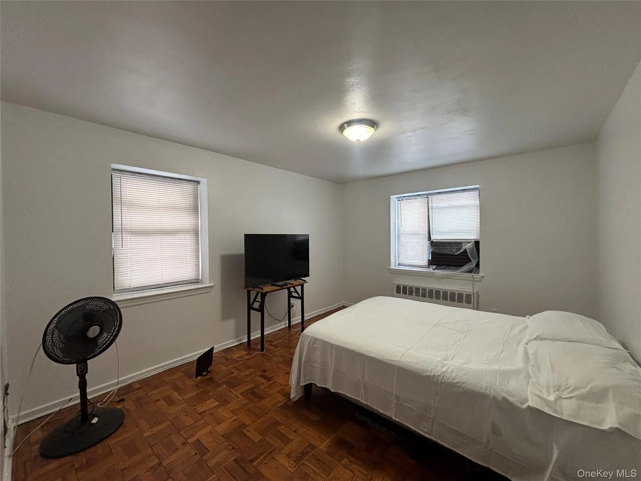 Primary bedroom with double exposure. Primary bedroom with double exposure.