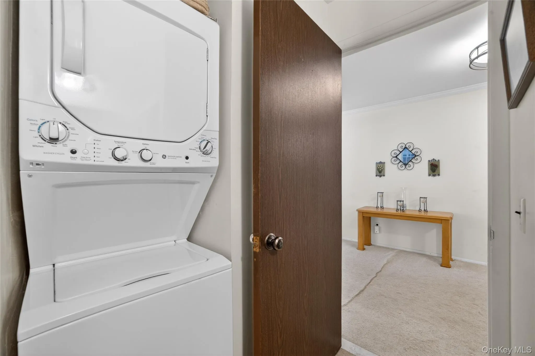 Hall Bathroom spacious enough to have ample room for the stackable washer & dryer. Hall Bathroom spacious enough to have ample room for the stackable washer & dryer.