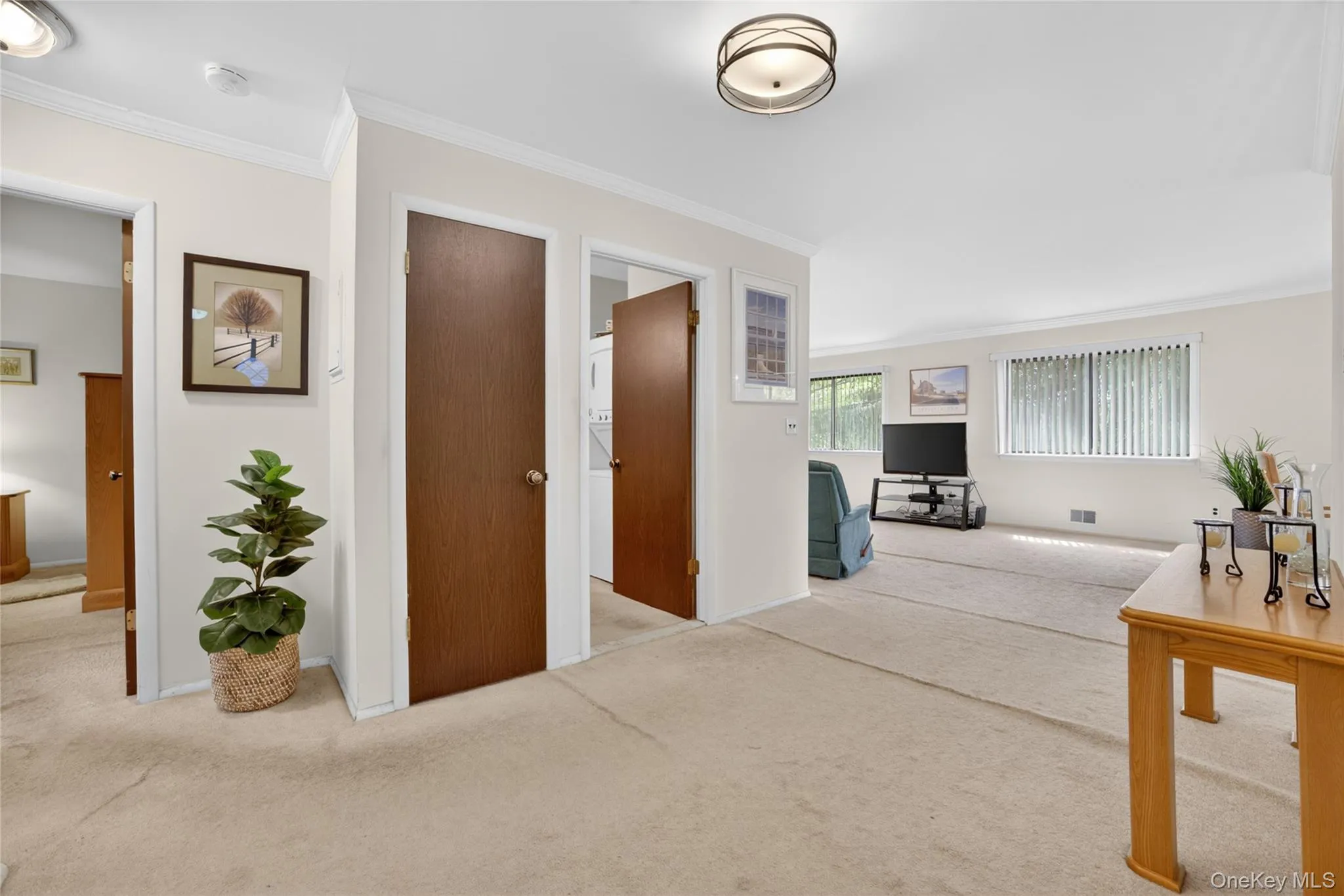View of the condo from the entryway. Includes storage closet, hall full bathroom. View of the condo from the entryway. Includes storage closet, hall full bathroom.