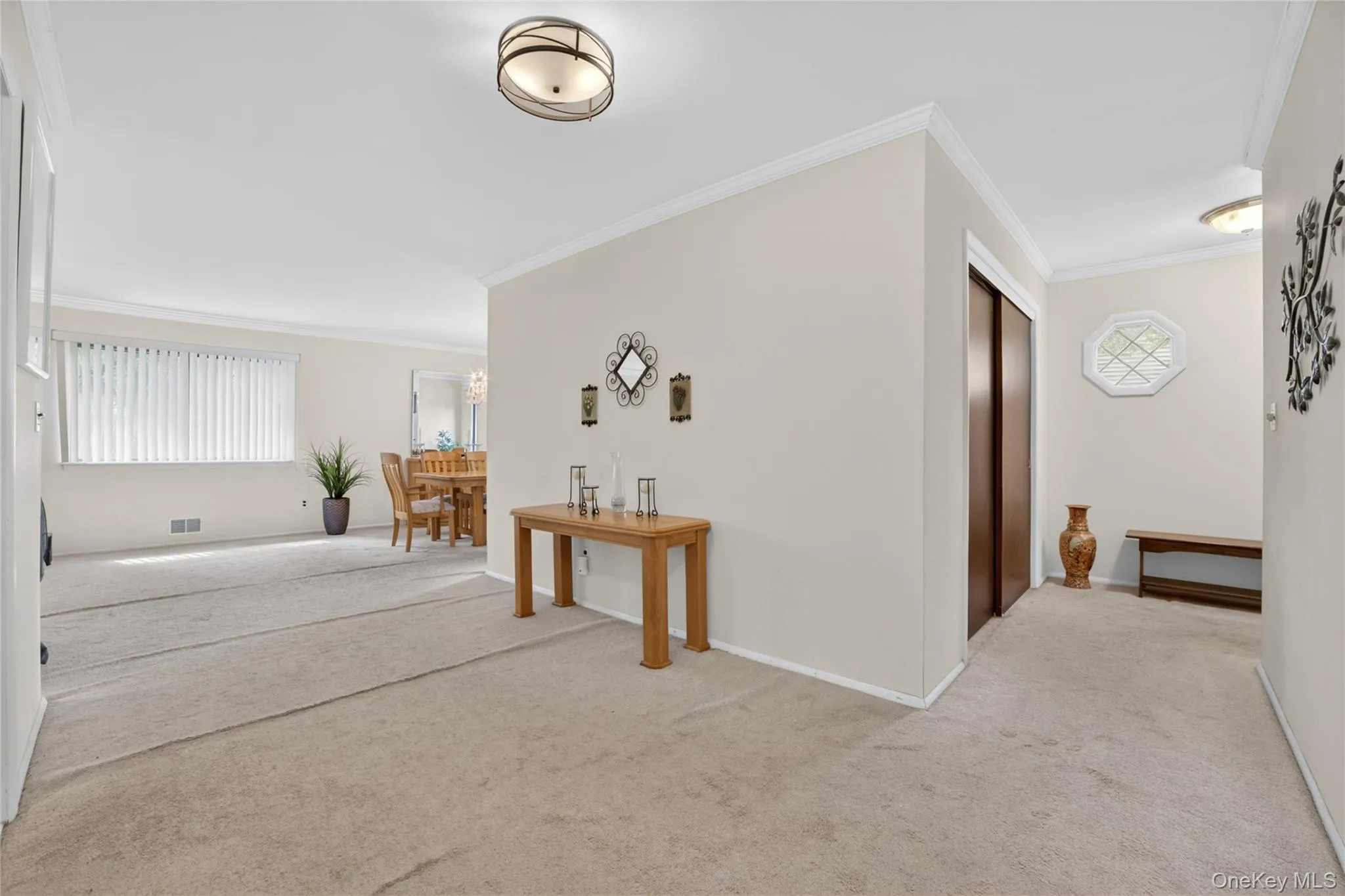 Entry far right with Double closet for coats, and storage, and window in the entryway for so much natural light. Entry far right with Double closet for coats, and storage, and window in the entryway for so much natural light.