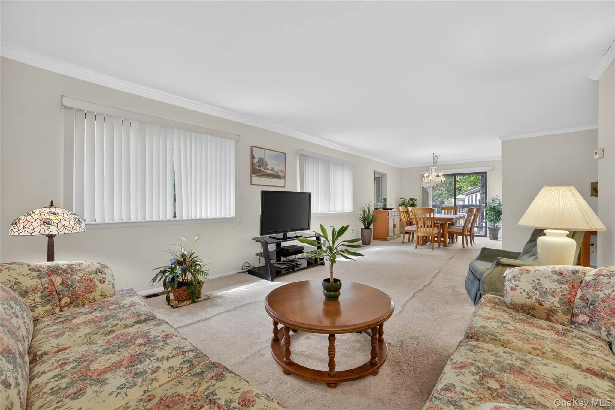 Double windows in the living and dining room with sliding glass doors for so much natural light. Double windows in the living and dining room with sliding glass doors for so much natural light.