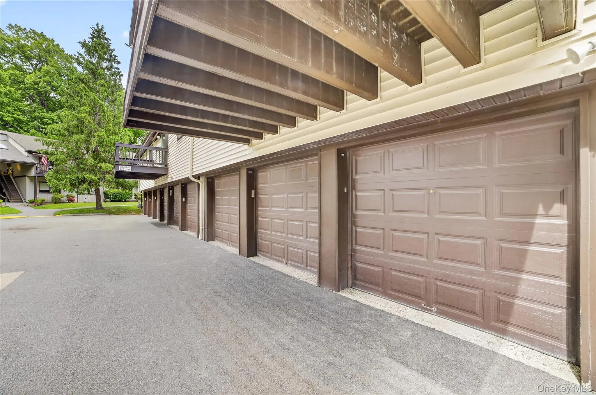 Garage bays all labelled with condo numbers in adjacent building #124 Garage bays all labelled with condo numbers in adjacent building #124