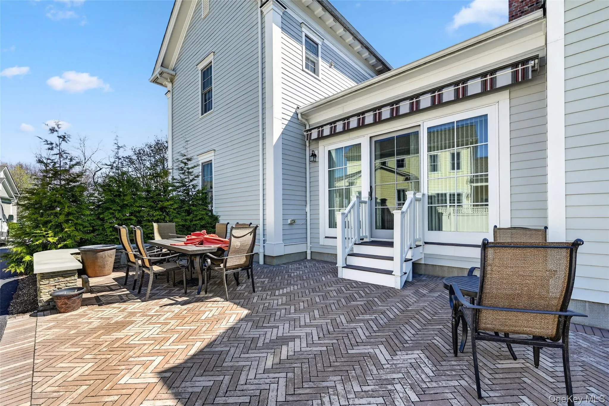 Seamless indoor-outdoor flow to the private herringbone paver patio. This quiet outdoor retreat is perfect for relaxing or entertaining. Seamless indoor-outdoor flow to the private herringbone paver patio. This quiet outdoor retreat is perfect for relaxing or entertaining.