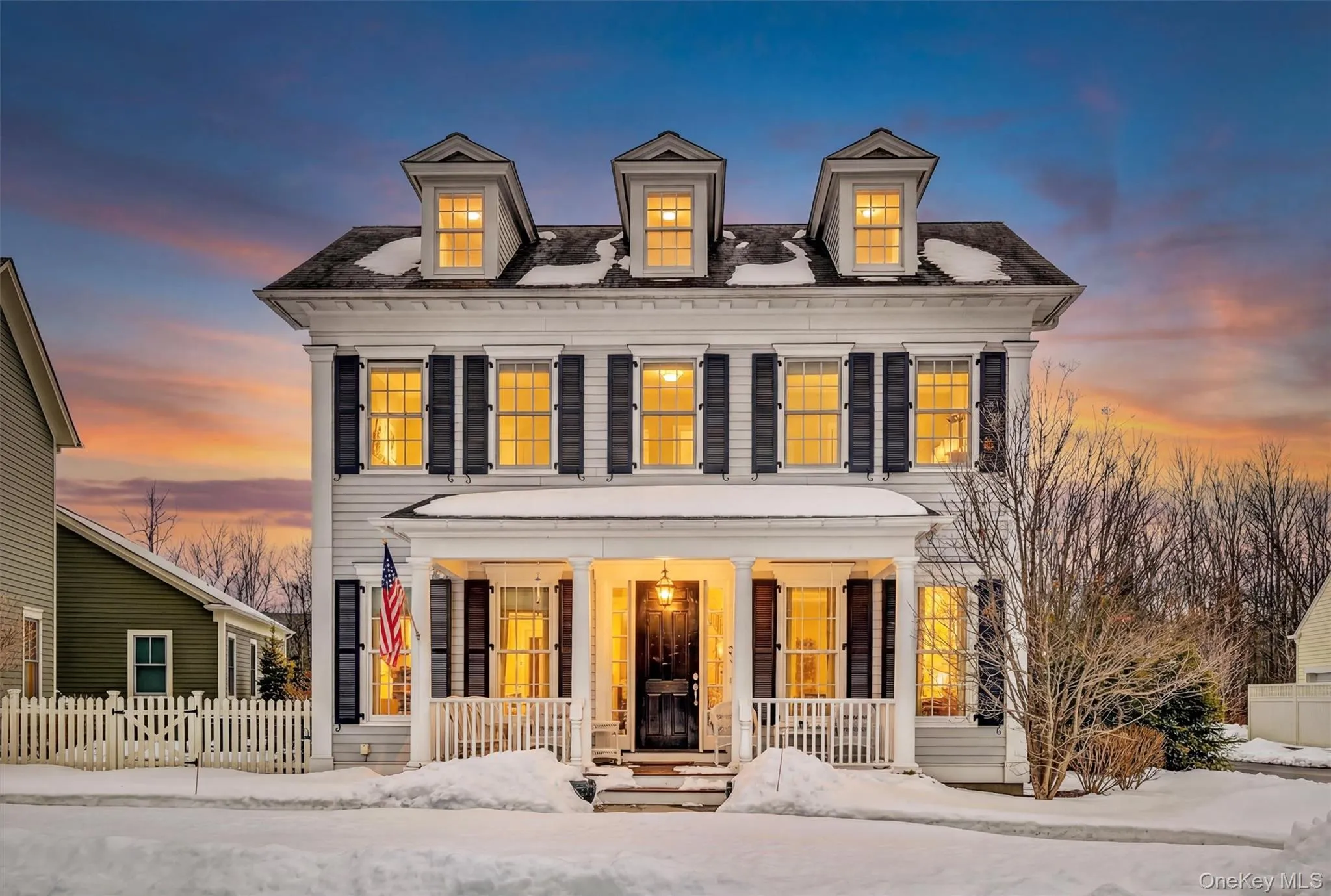 Timeless Colonial architecture in Warwick Grove, a premier 55+ community in Warwick, NY, glowing warmly at sunset. Photo taken just a few short weeks ago when winter was on it's way out. Timeless Colonial architecture in Warwick Grove, a premier 55+ community in Warwick, NY, glowing warmly at sunset. Photo taken just a few short weeks ago when winter was on it's way out.