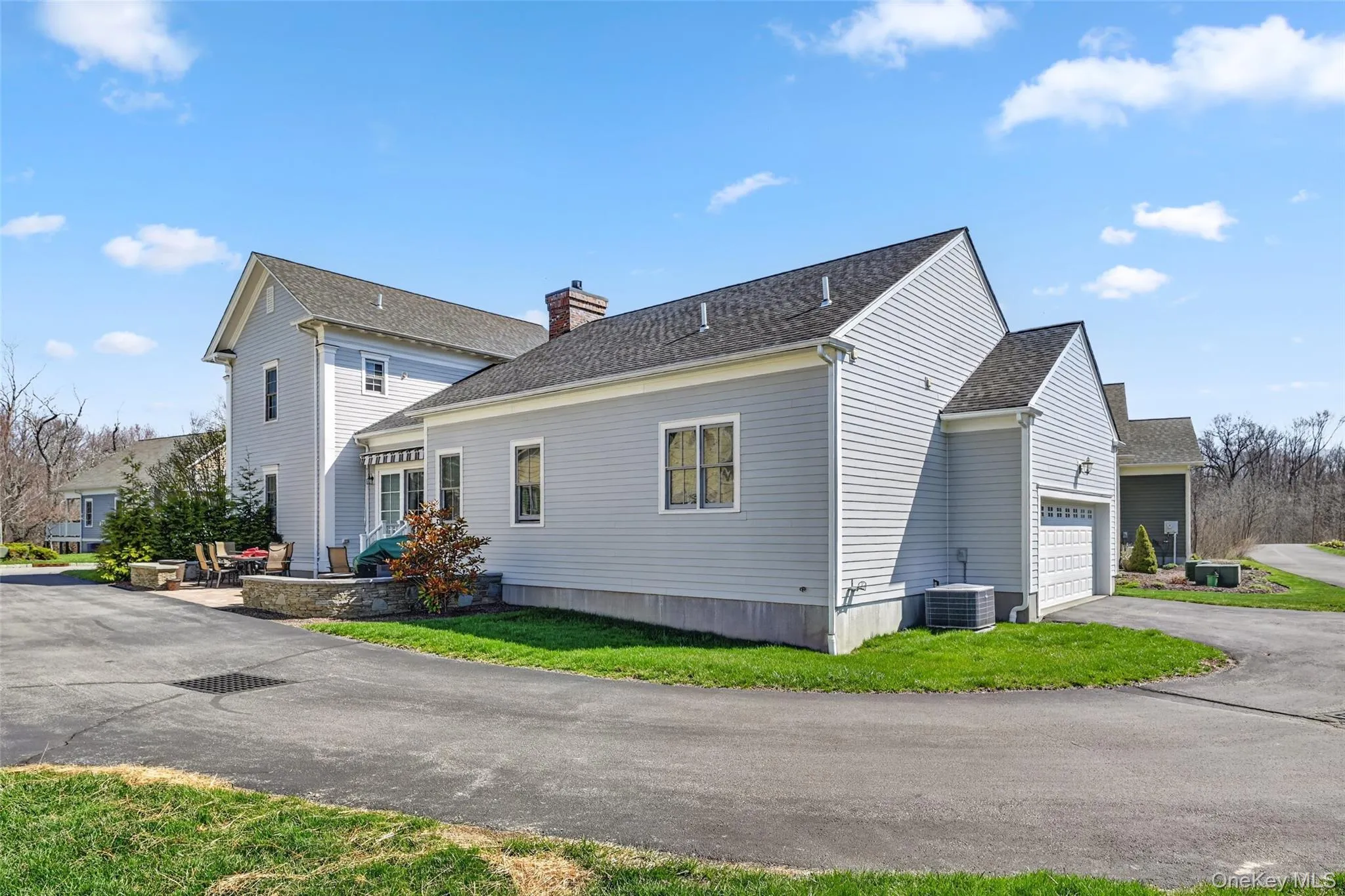 Shared driveway leads to the 2-car attached garage. Shared driveway leads to the 2-car attached garage.