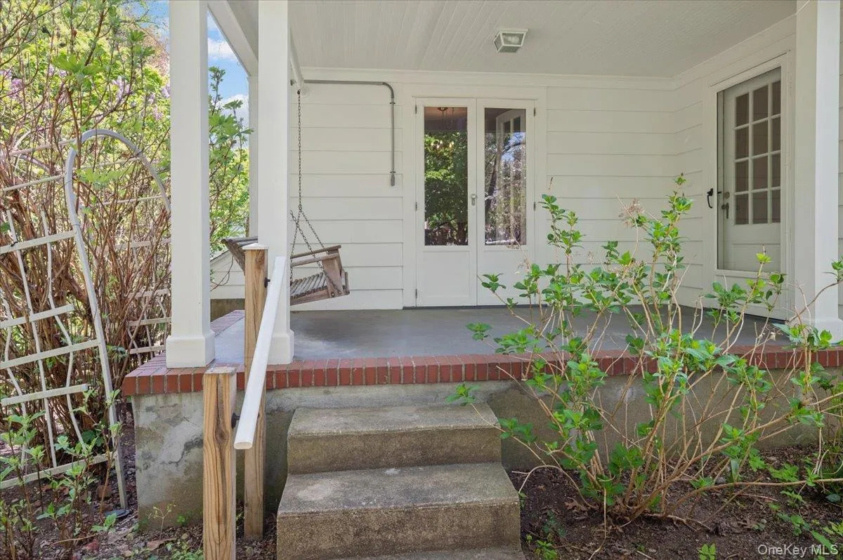 Side porch off den Side porch off den