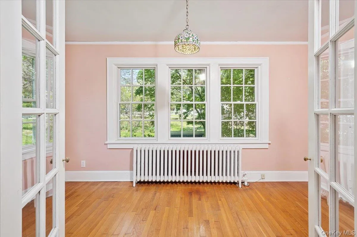 Photo of the den with hardwood floors off the living room Photo of the den with hardwood floors off the living room