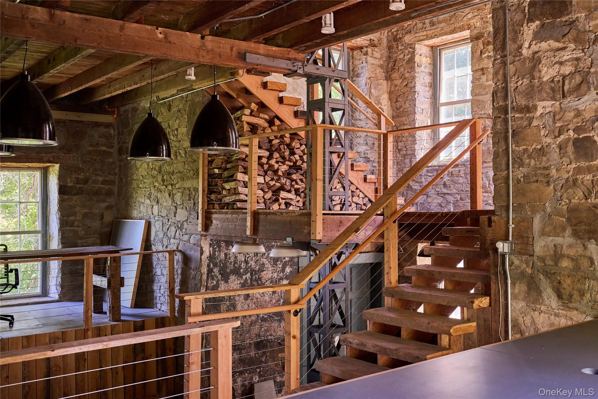 Stairway featuring plenty of natural light Stairway featuring plenty of natural light