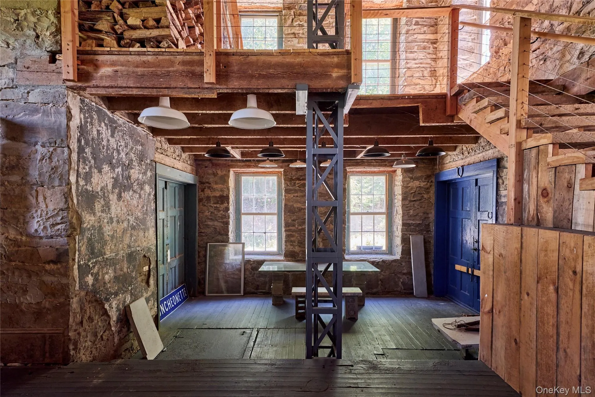 Miscellaneous room with hardwood / wood-style flooring and beamed ceiling Miscellaneous room with hardwood / wood-style flooring and beamed ceiling