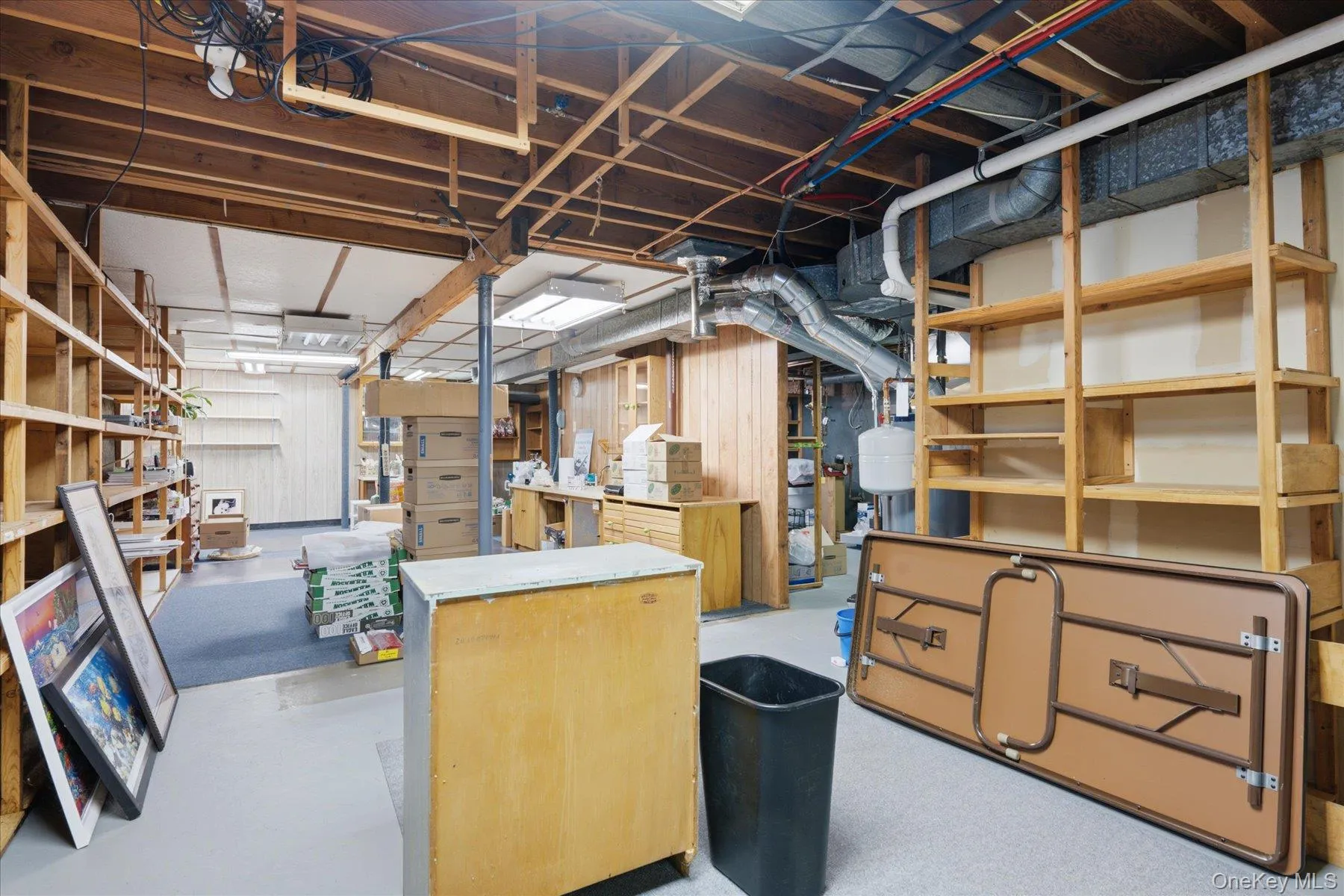 Large basement with tons of storage and built in shelving Large basement with tons of storage and built in shelving