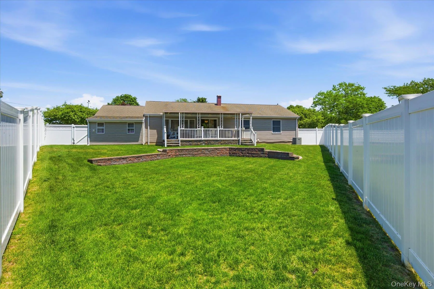 .26 property with nice size yard completely fenced with white vinyl fencing .26 property with nice size yard completely fenced with white vinyl fencing