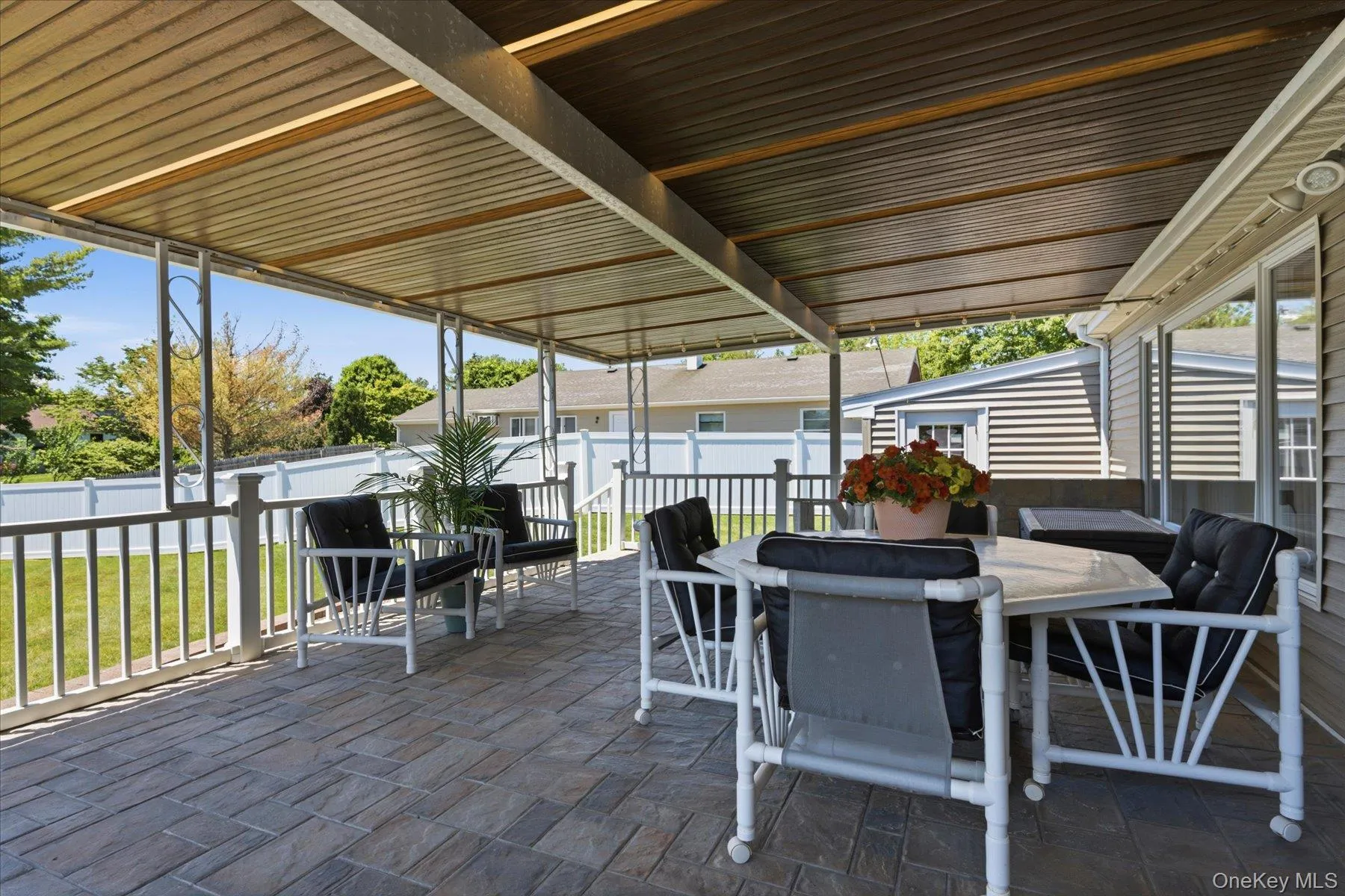 Backyard covered cement deck Perfect for outdoor entertaining all seasons and all type of weather. Backyard covered cement deck Perfect for outdoor entertaining all seasons and all type of weather.