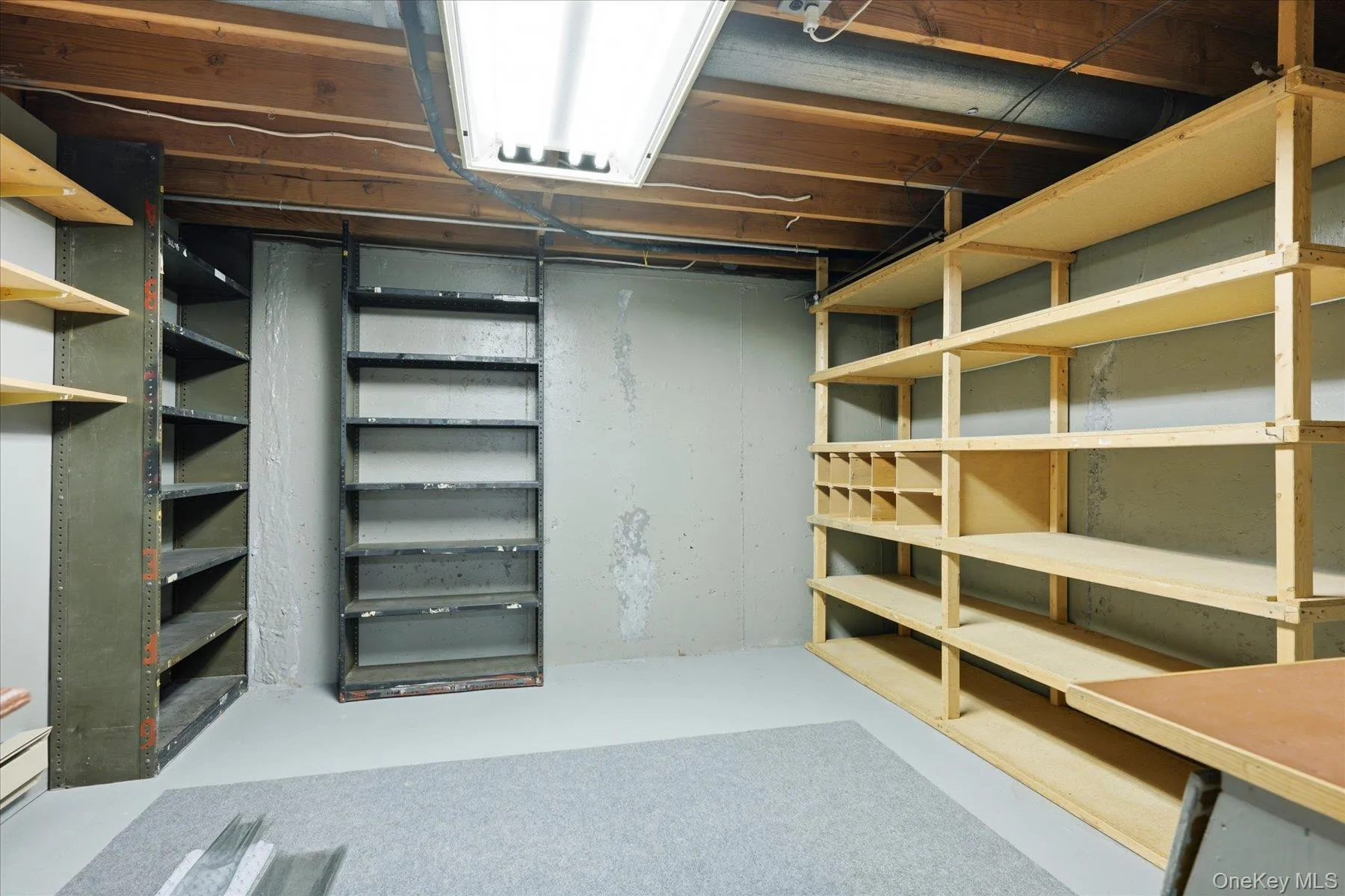 Large basement with tons of storage and built in shelving Large basement with tons of storage and built in shelving