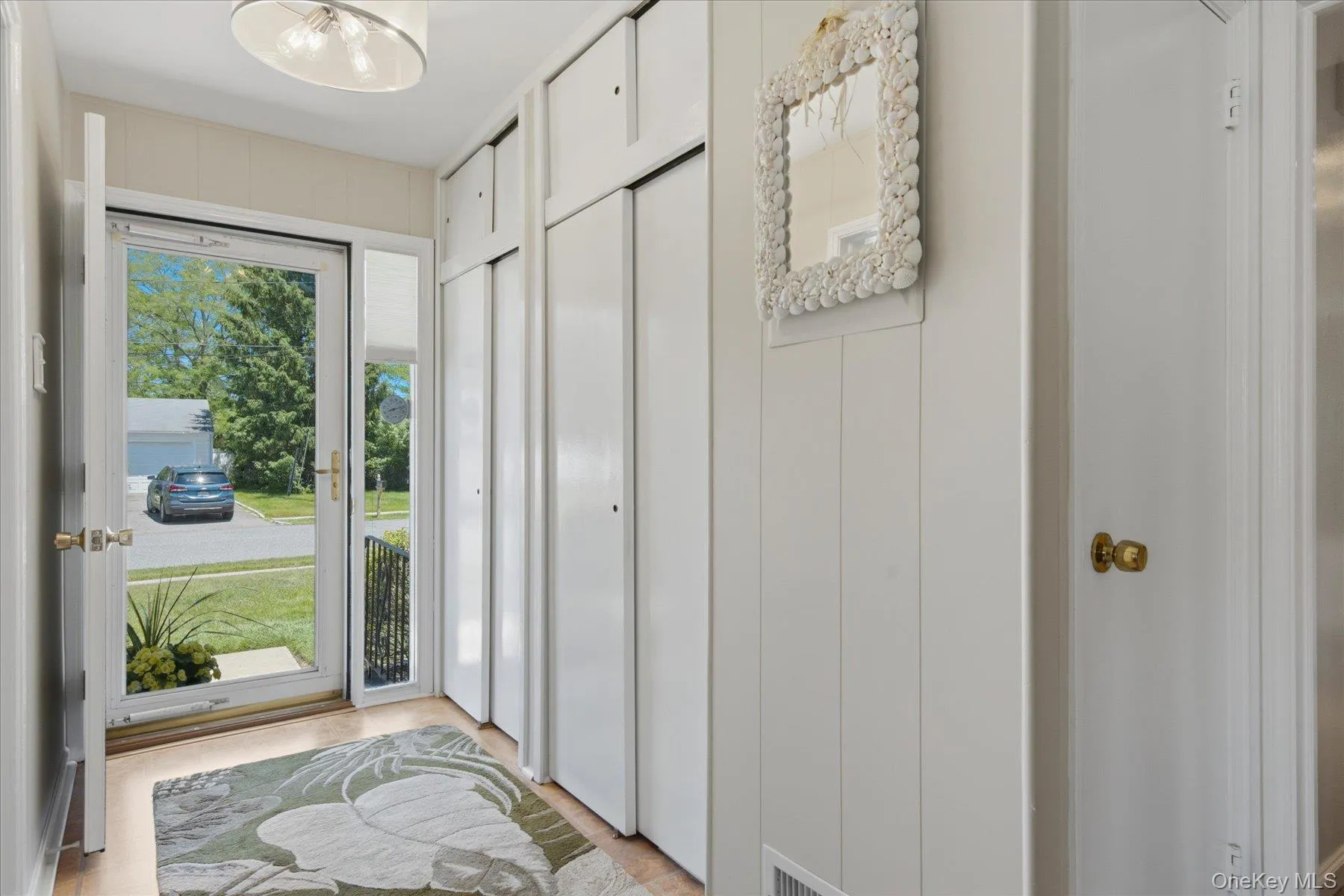 Entrance Foyer with Double Coat and storage closet Entrance Foyer with Double Coat and storage closet