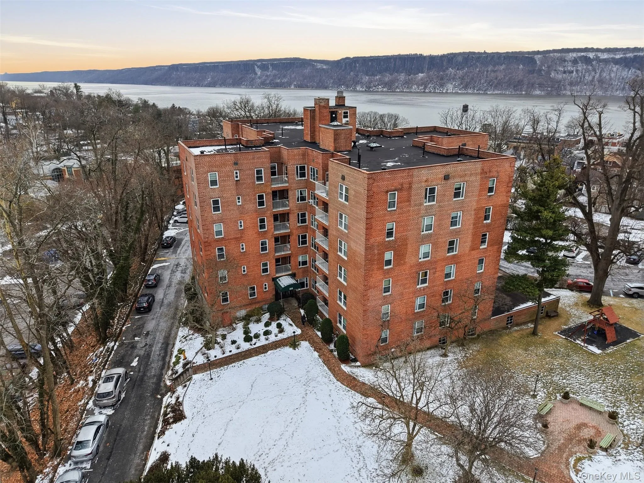 Aerial view showcasing the 555 Broadway building, conveniently located near downtown and the Hudson River. Aerial view showcasing the 555 Broadway building, conveniently located near downtown and the Hudson River.